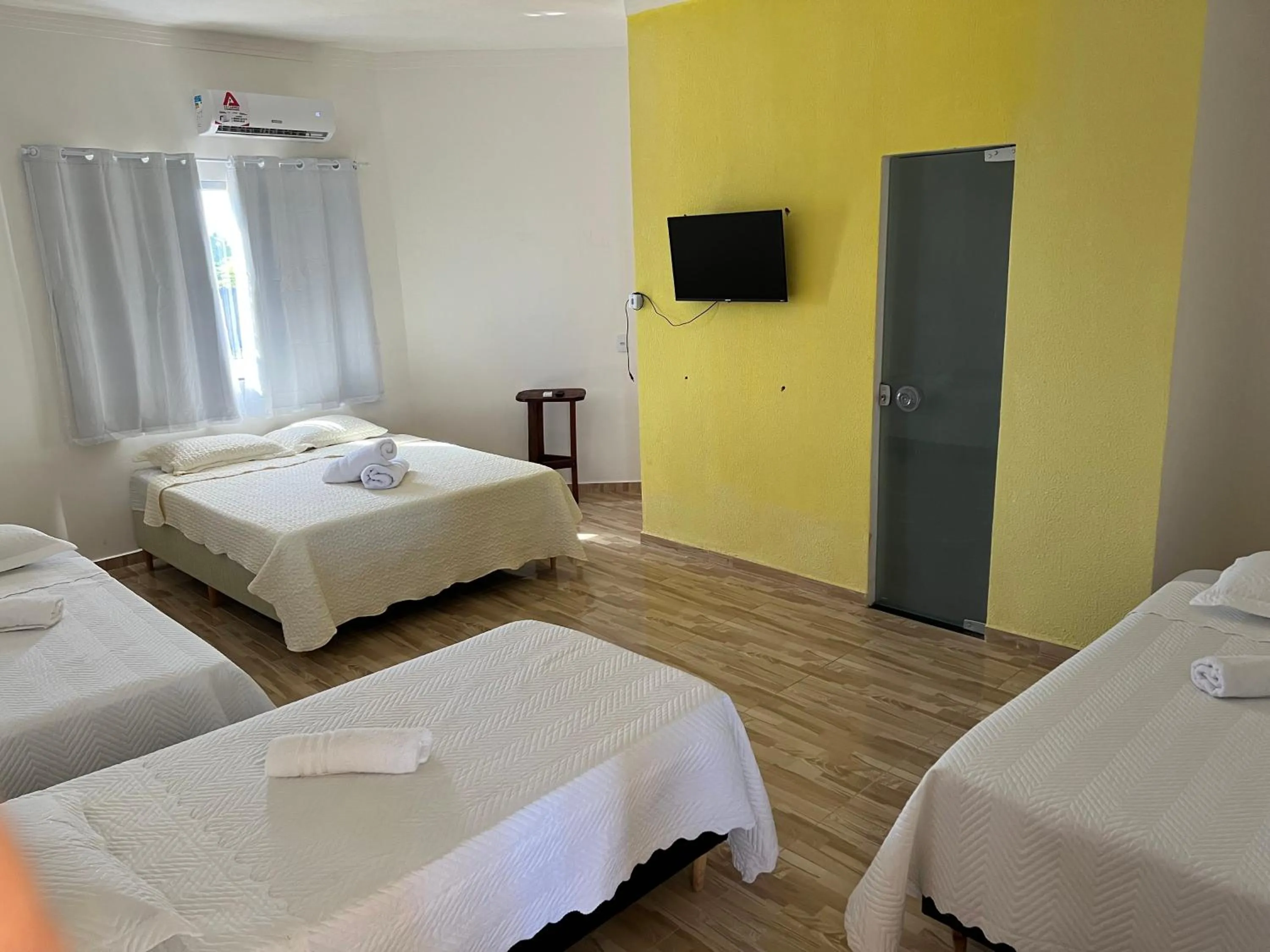 Bed in Pousada Recanto Vila Viçosa