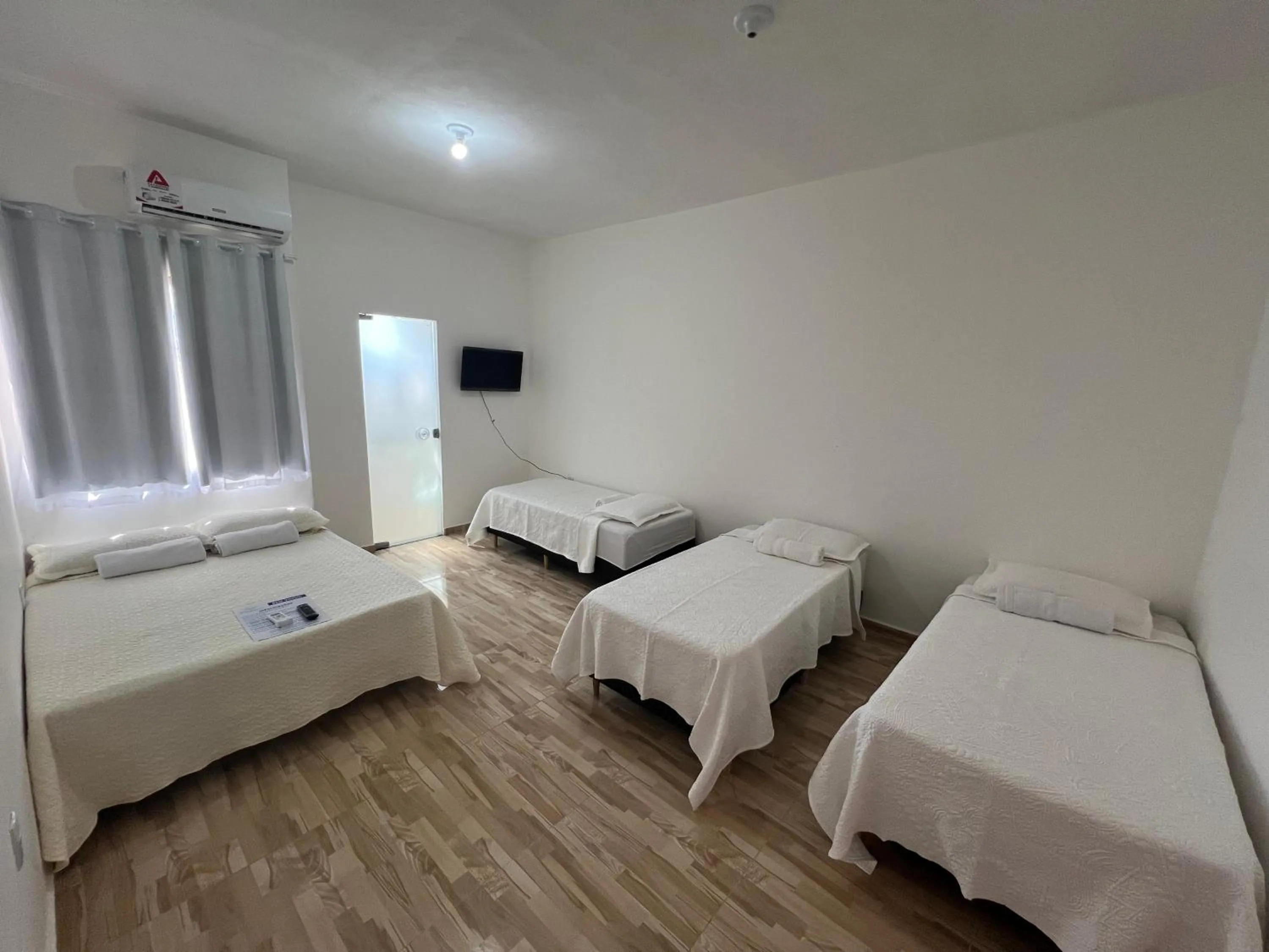 Bed in Pousada Recanto Vila Viçosa