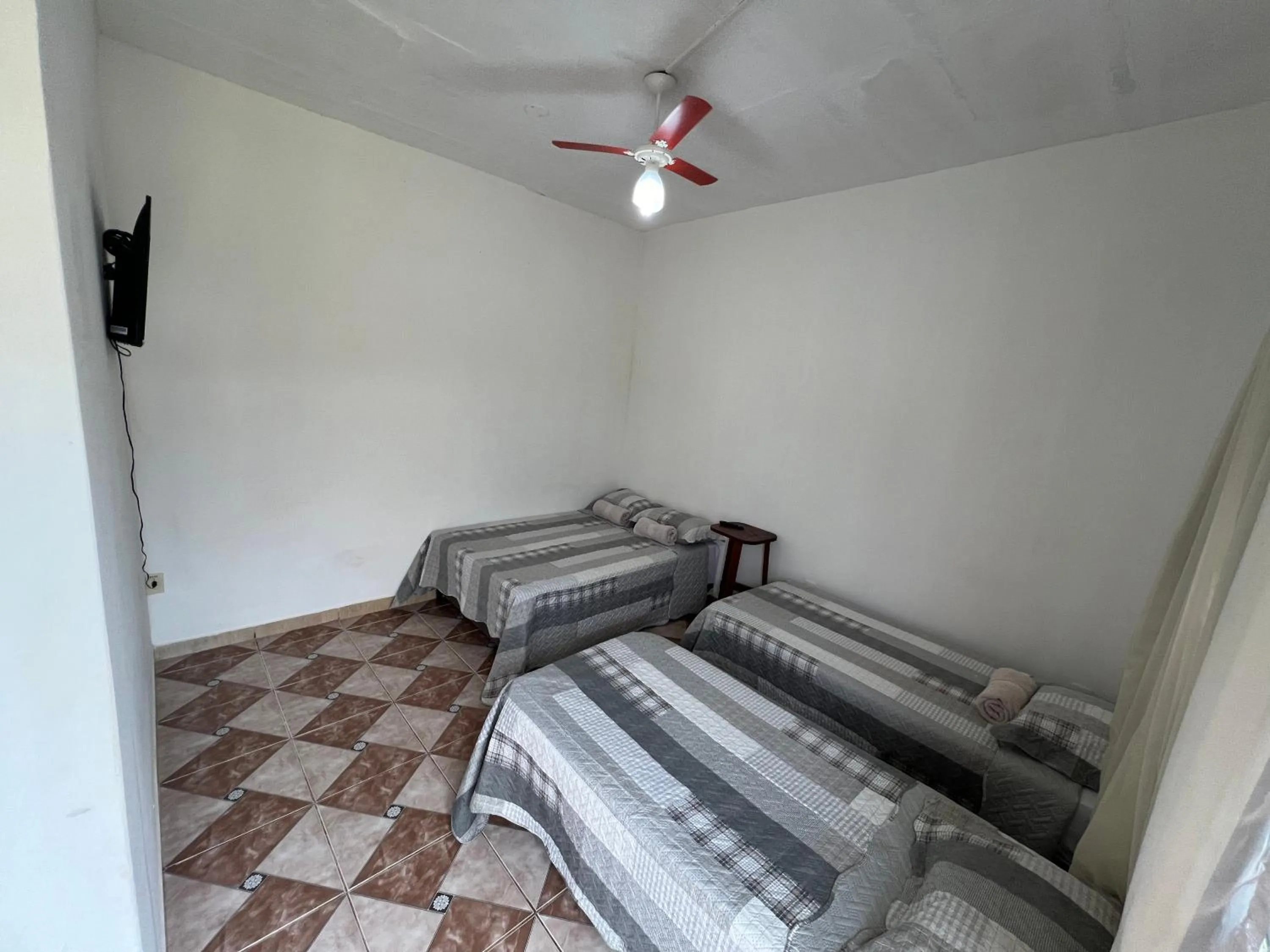 Bed in Pousada Recanto Vila Viçosa