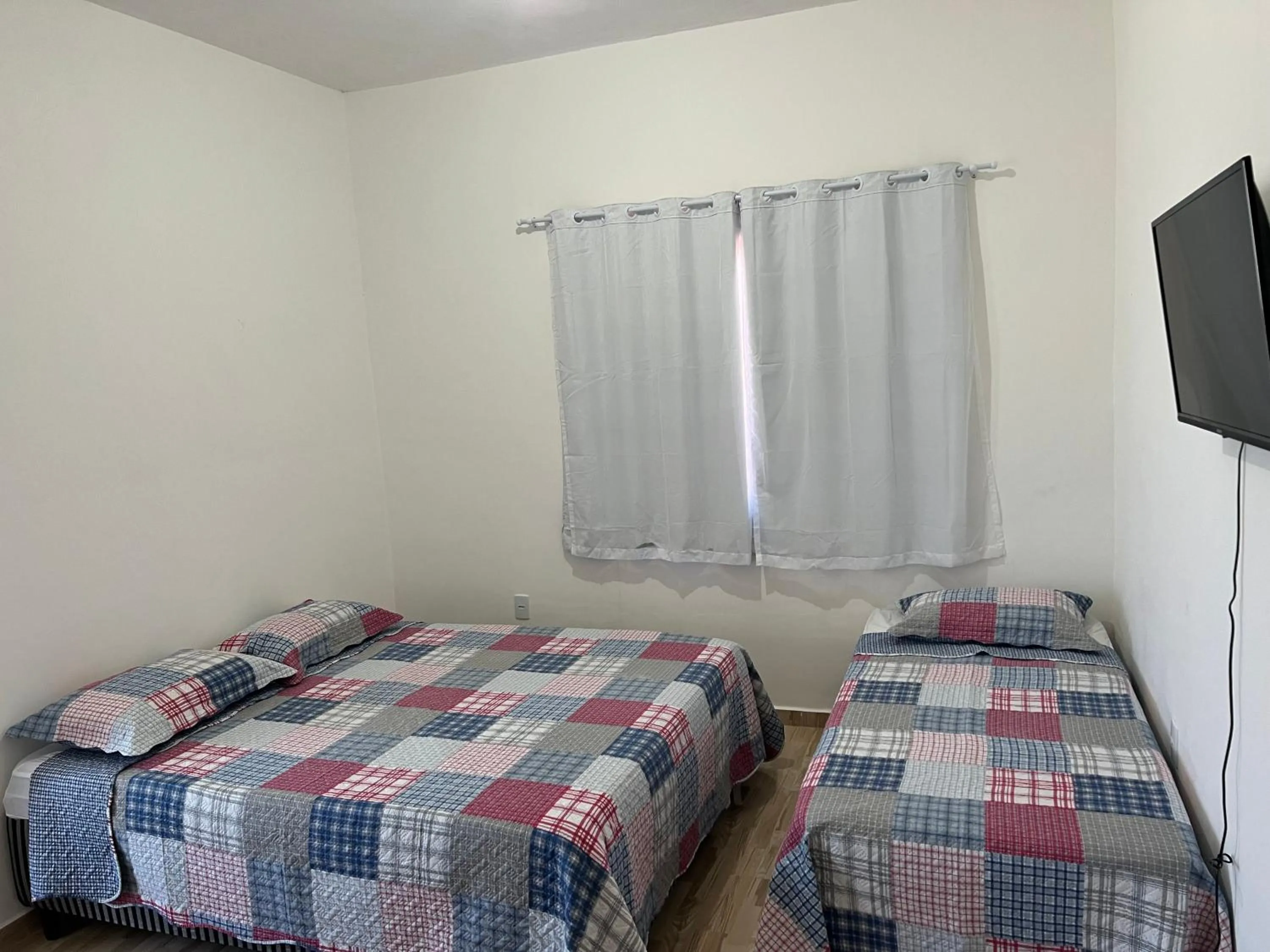 Bed in Pousada Recanto Vila Viçosa