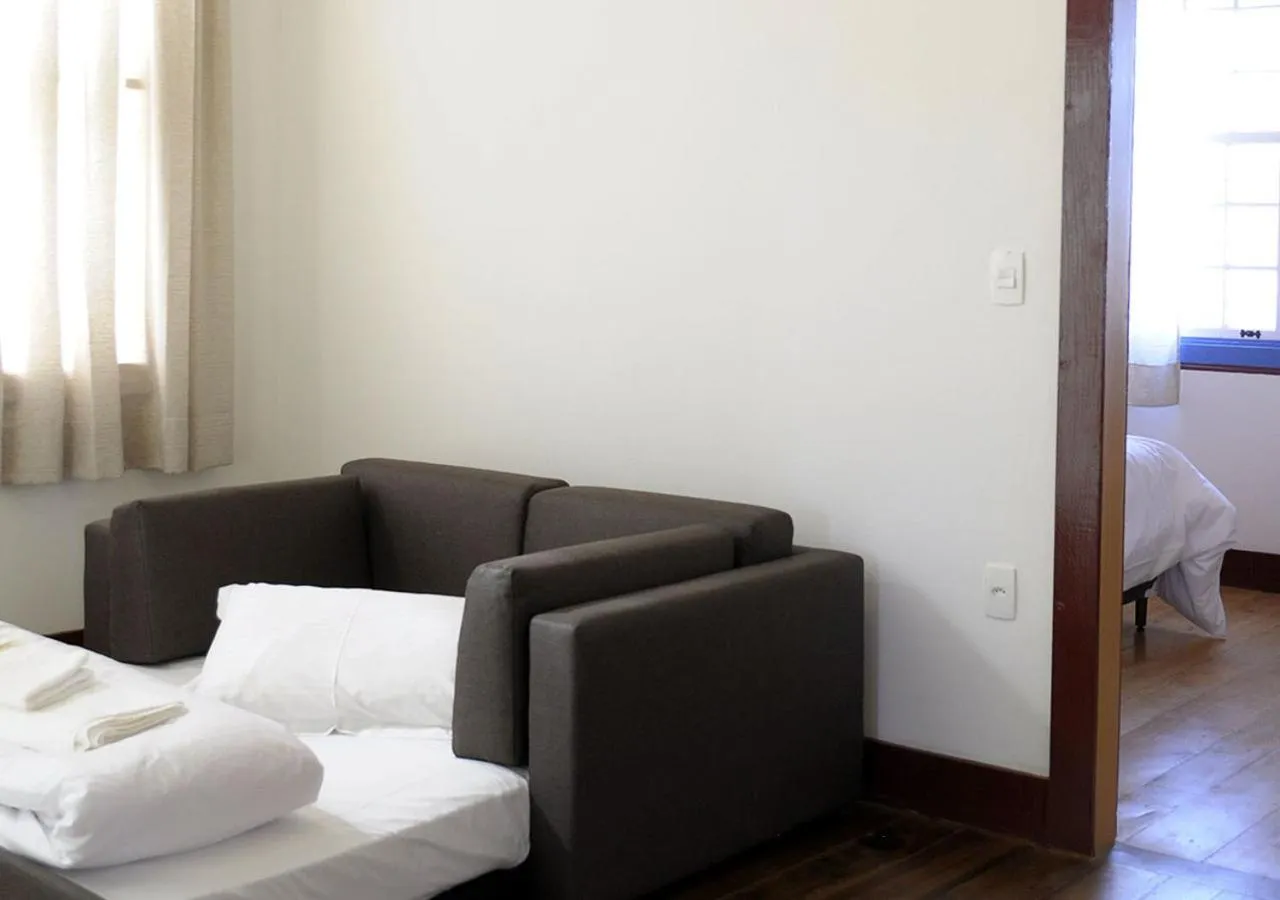 Seating area, Bed in Pouso da Chica