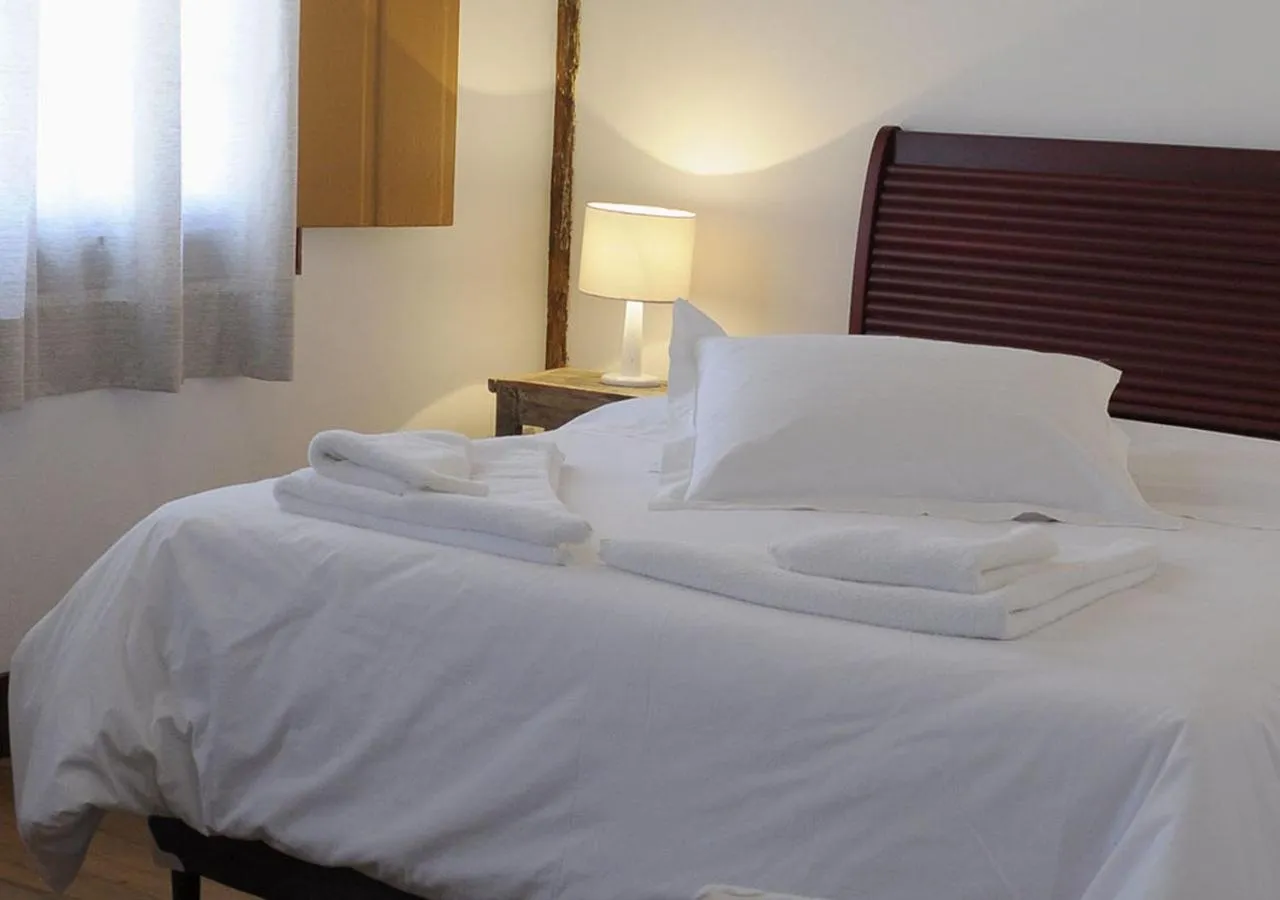 Bed in Pouso da Chica