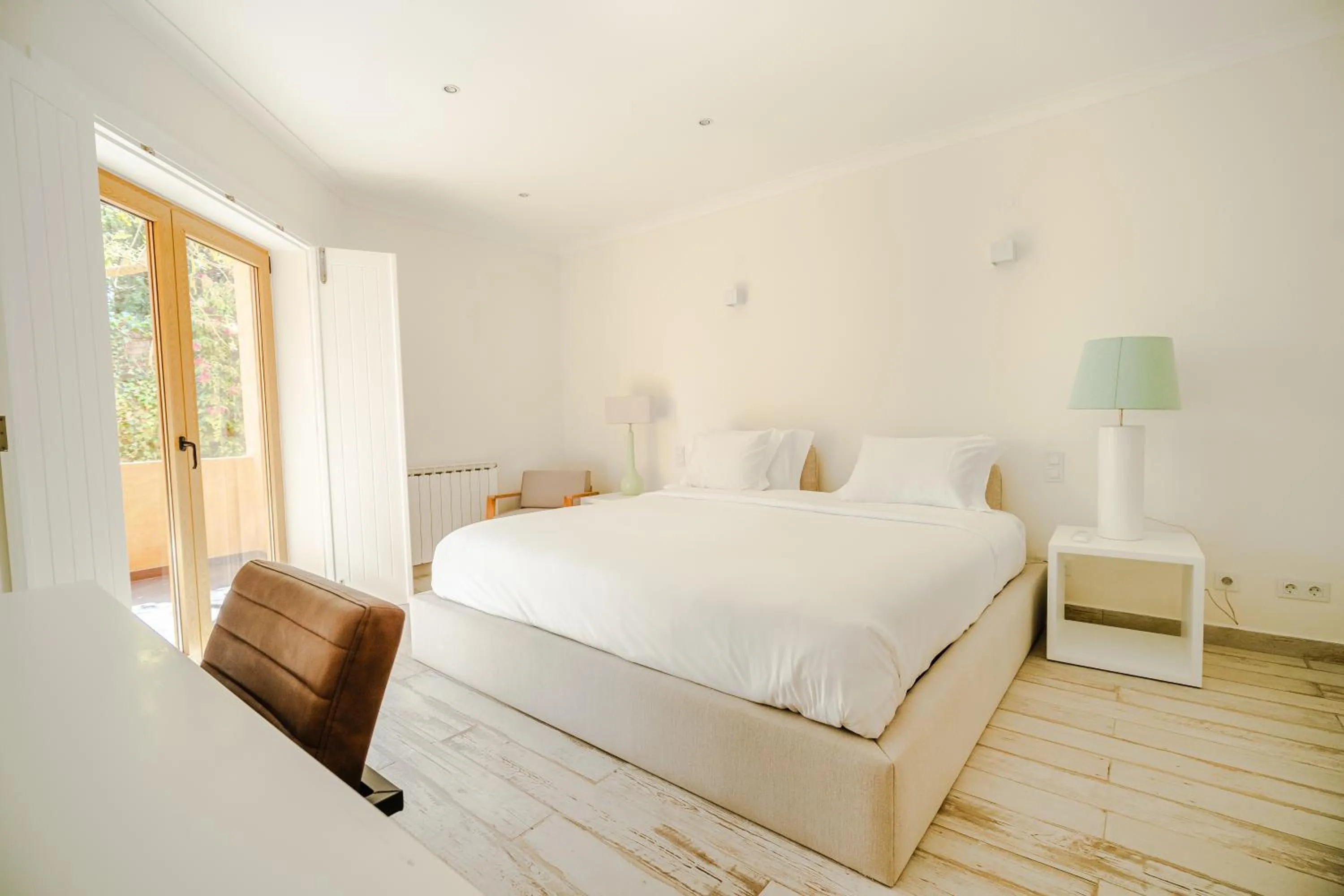 Bed in Casa Pôr do Sal - Boutique Guesthouse with Heated Pool & Sea Views