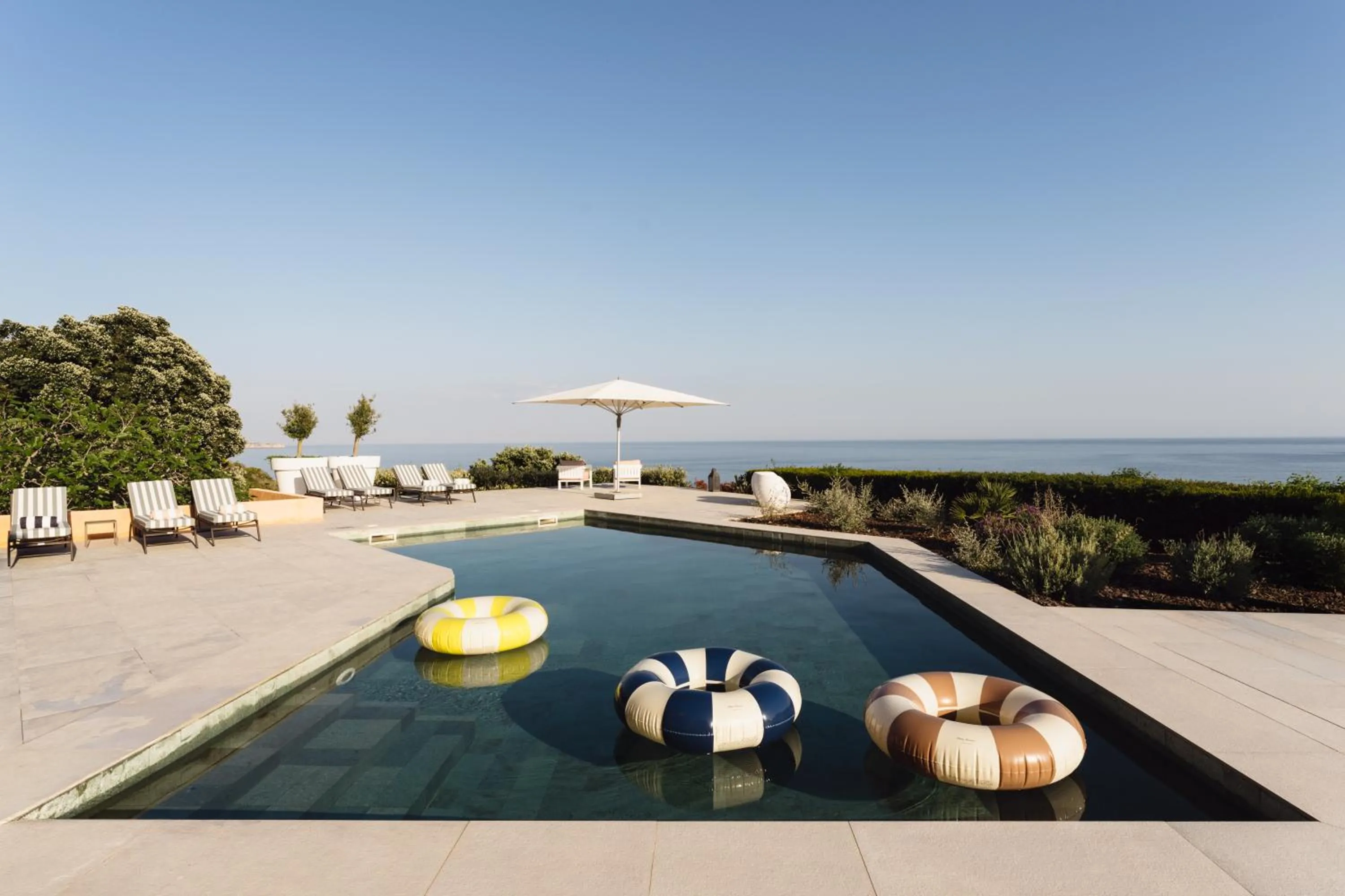 Swimming pool in Casa Pôr do Sal - Boutique Guesthouse with Heated Pool & Sea Views