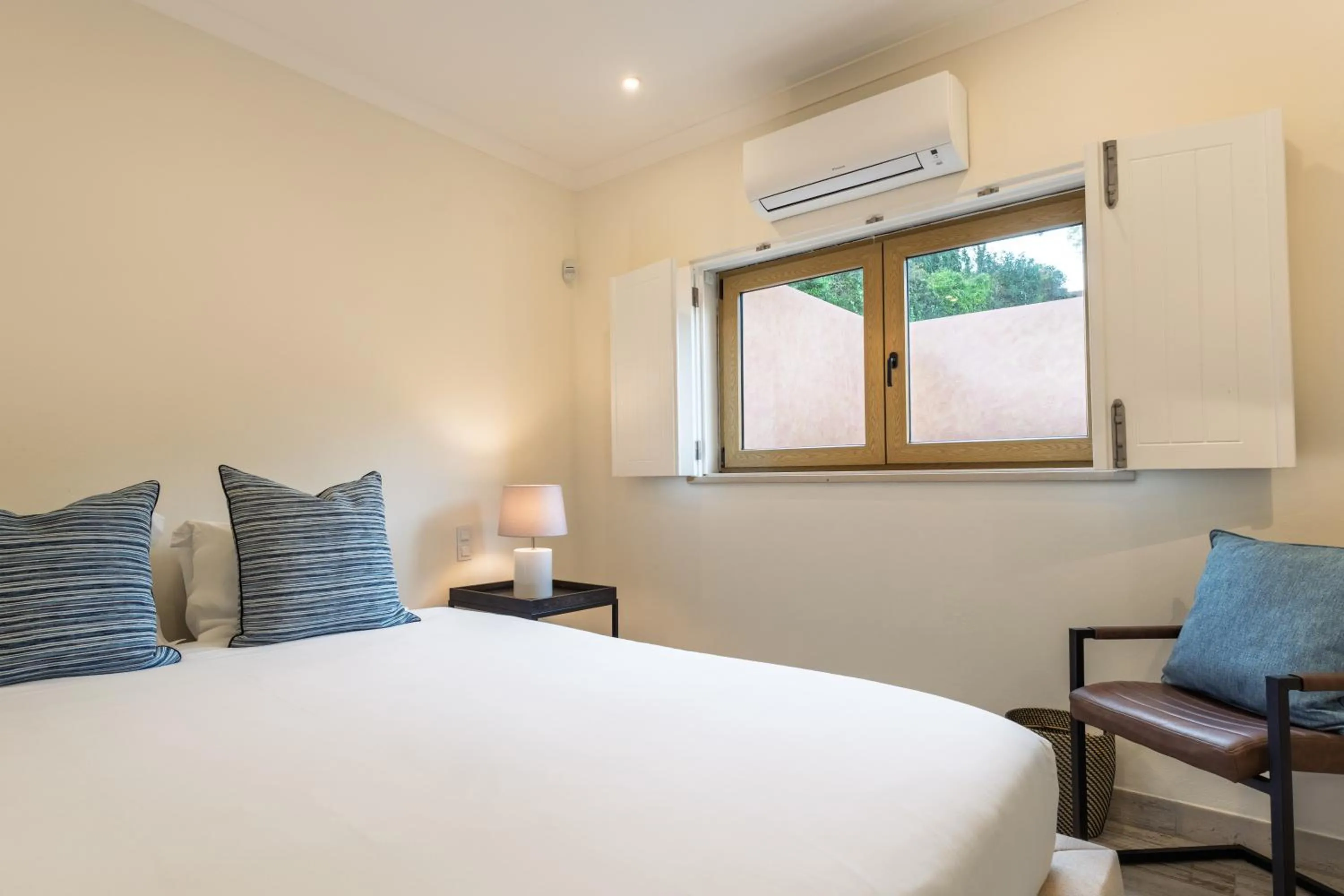 Bed in Casa Pôr do Sal - Boutique Guesthouse with Heated Pool & Sea Views