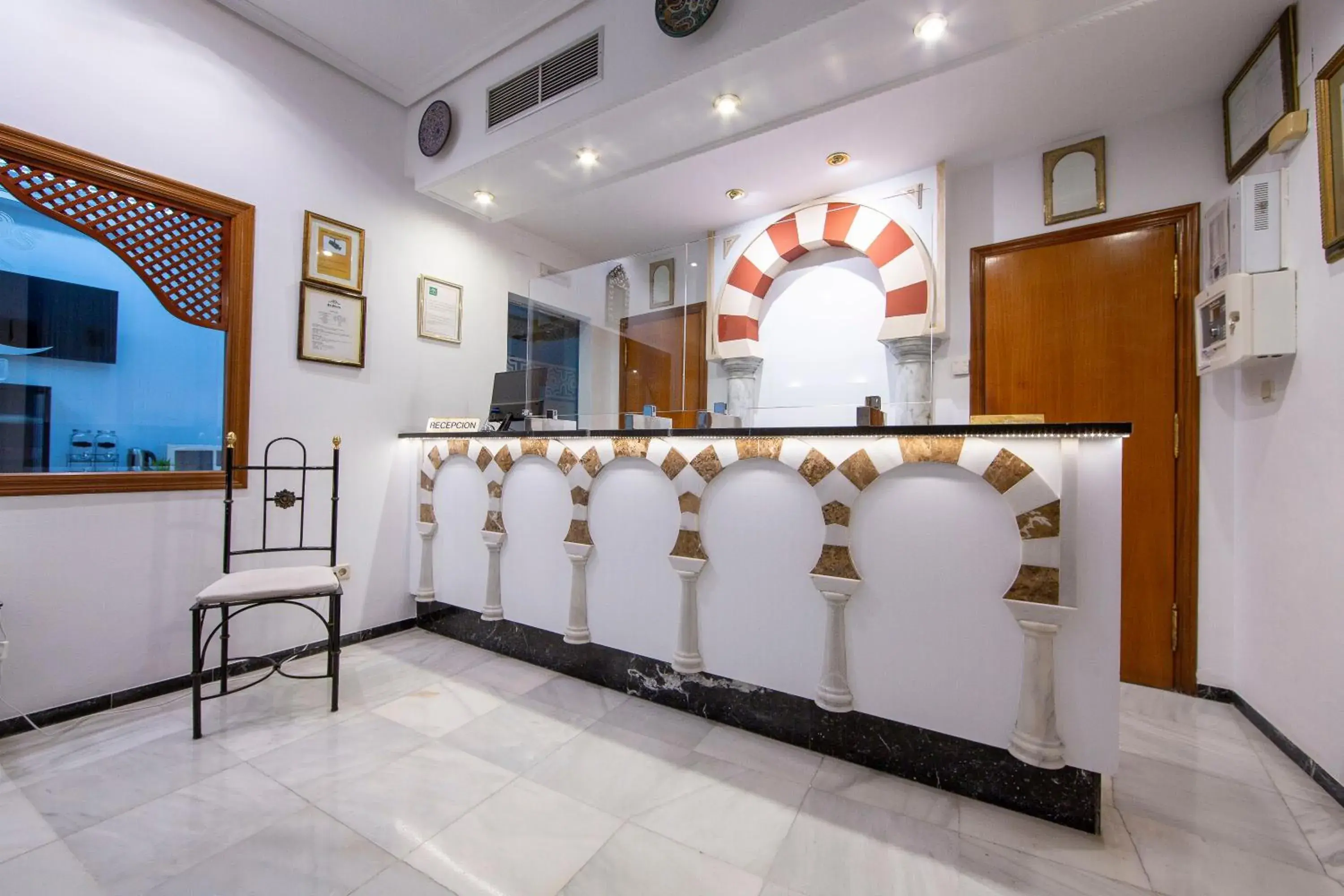 Lobby or reception in Hotel Los Omeyas Lobby or reception in Hotel Los Omeyas