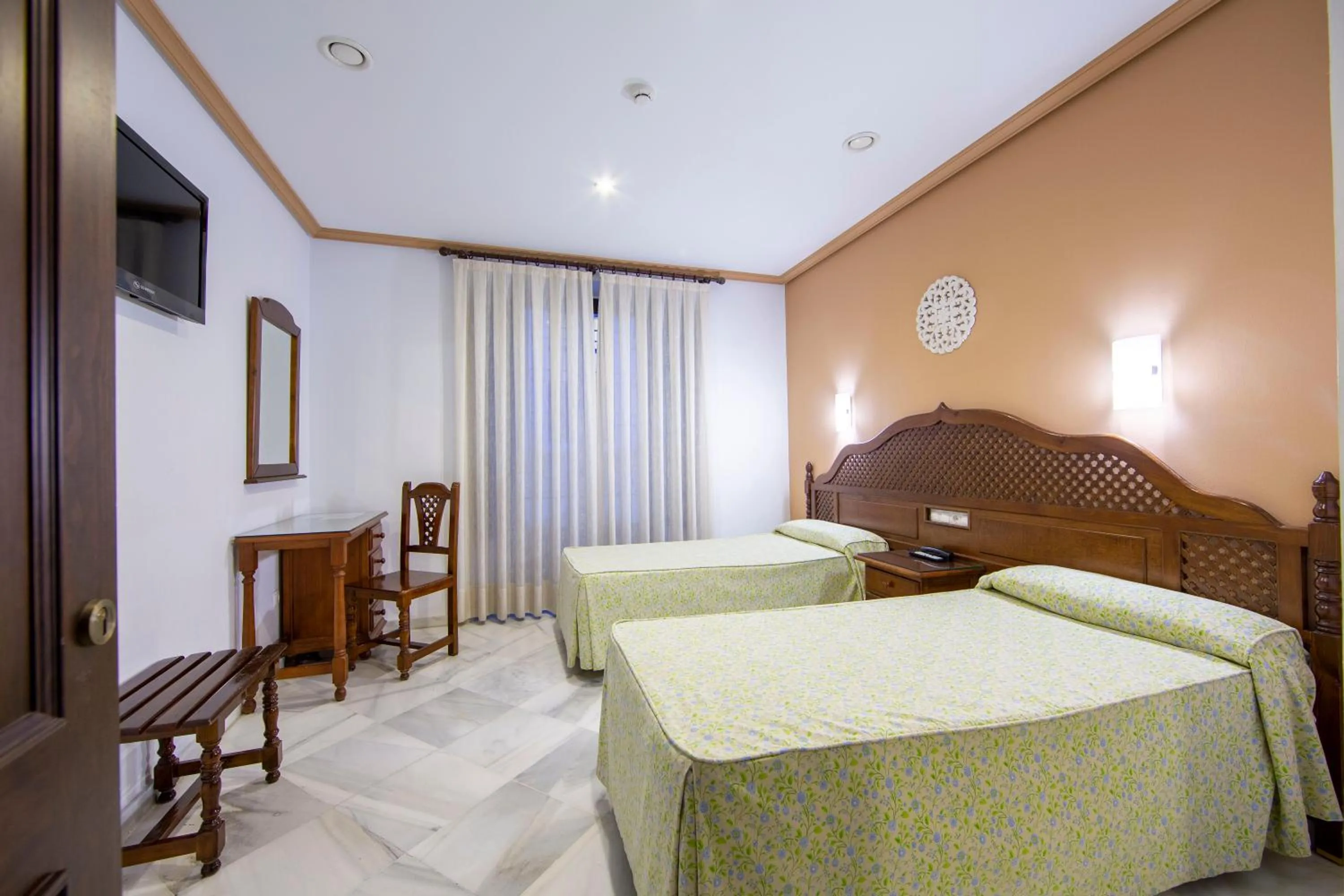 Bed in Hotel Los Omeyas