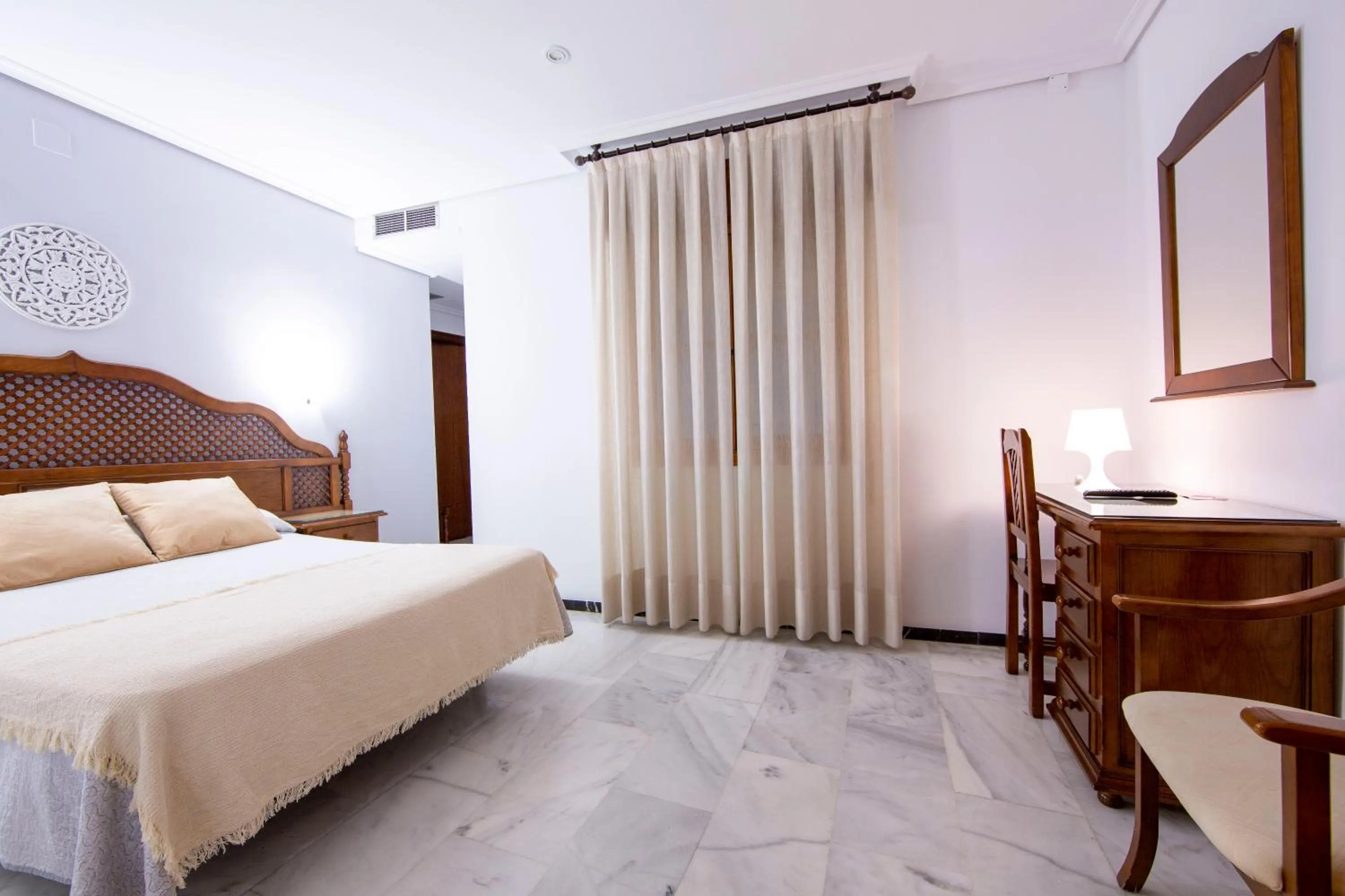 Bed in Hotel Los Omeyas