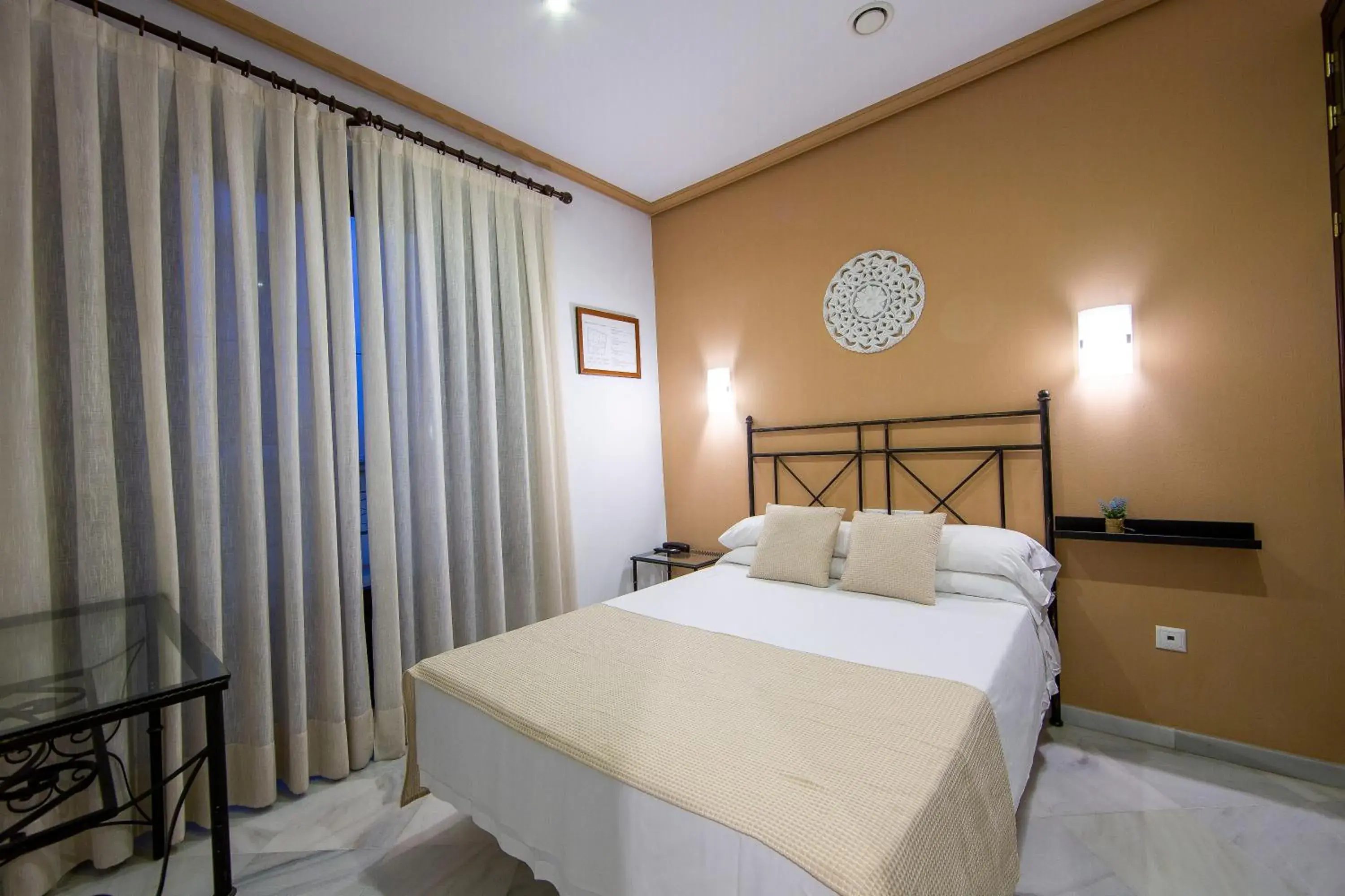 Bed in Hotel Los Omeyas Bed in Hotel Los Omeyas