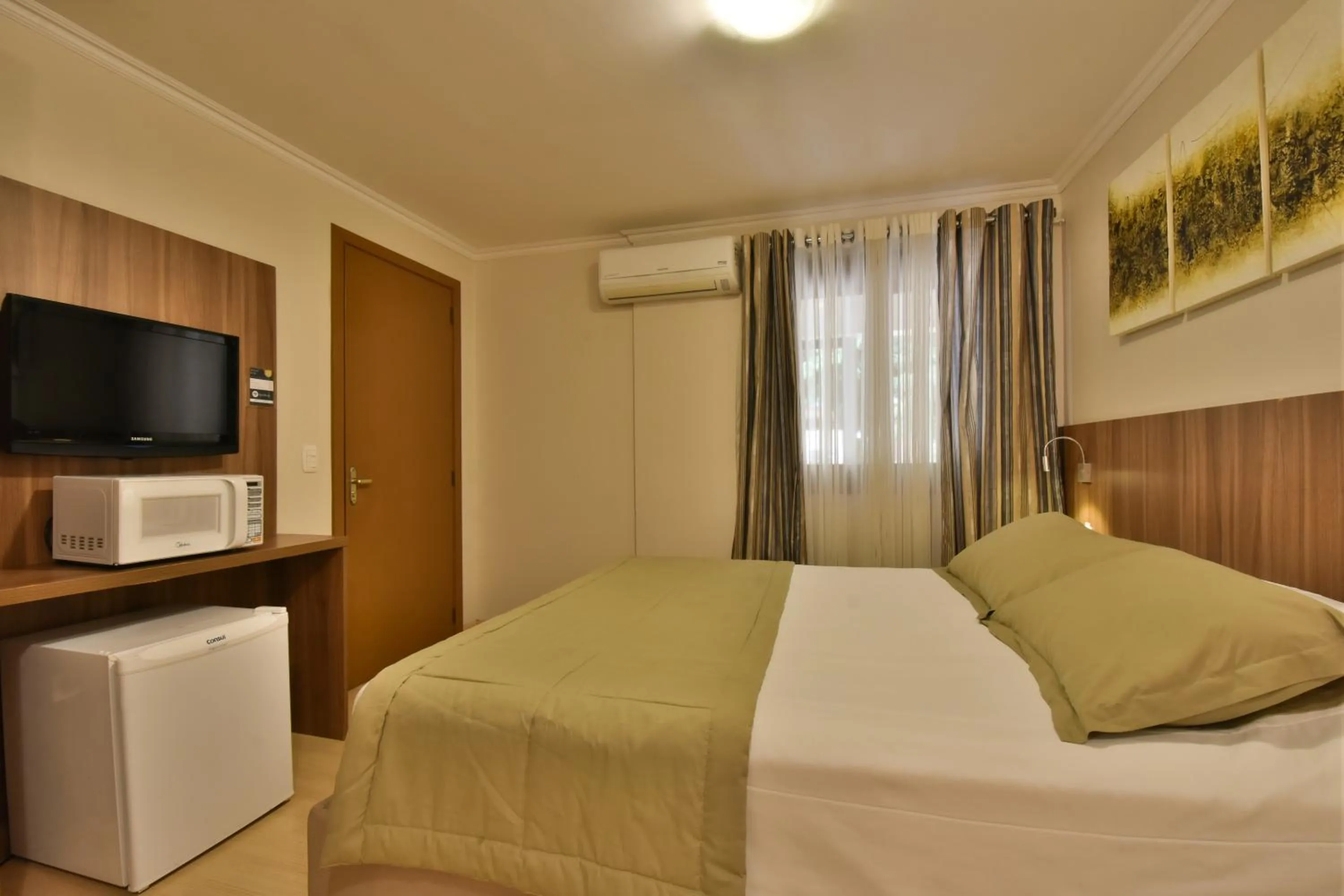 Bed in Pousada Stillo Gramado