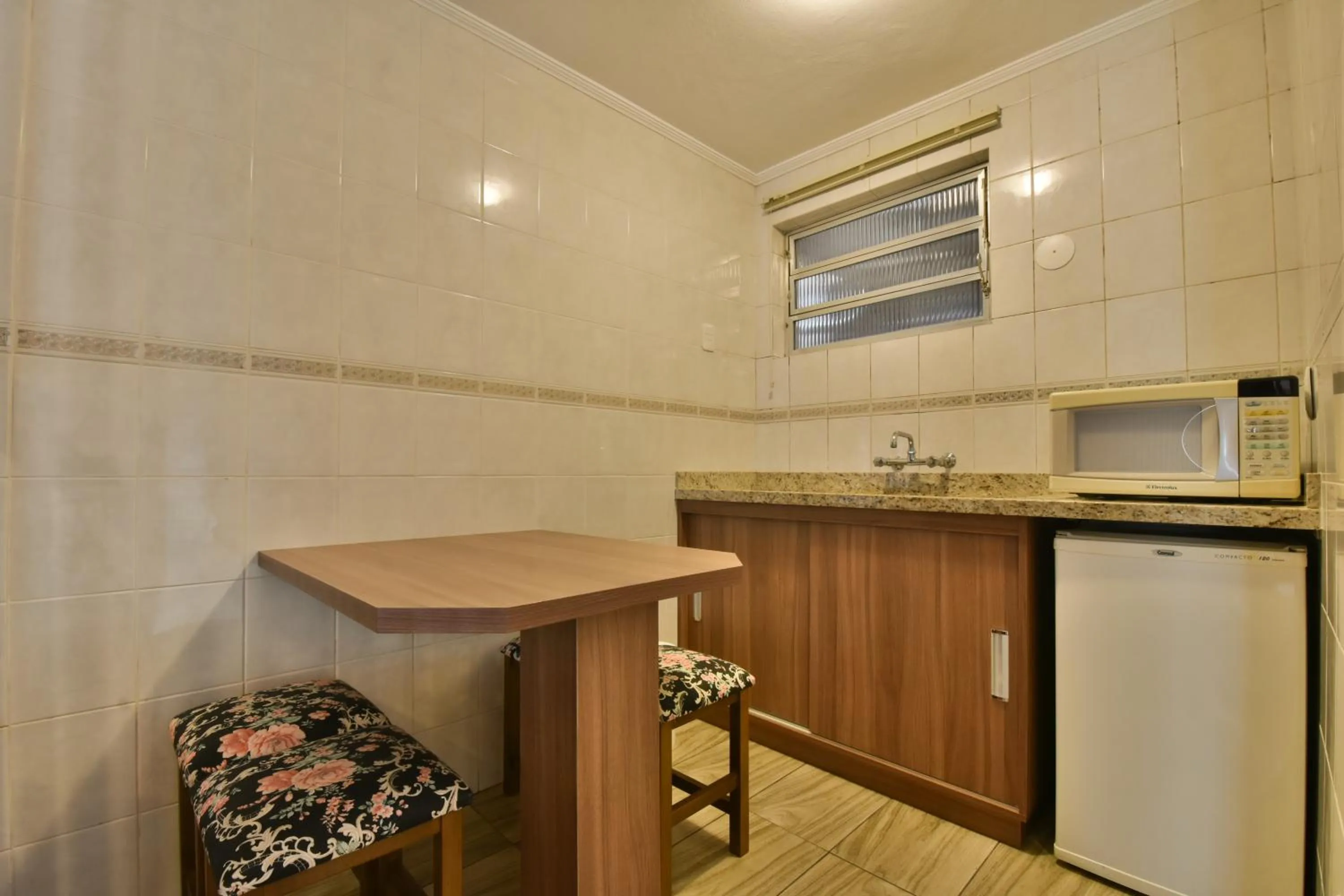 Kitchen or kitchenette in Pousada Stillo Gramado