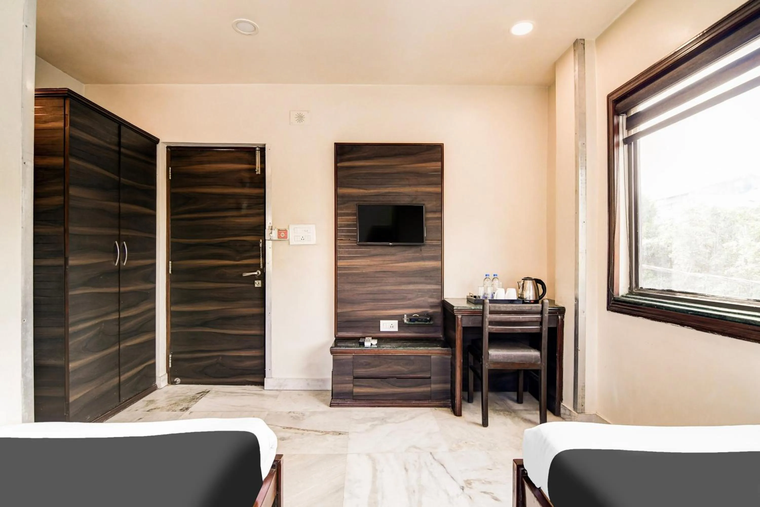 Bedroom in Super Collection O Belgacihia Near Kolkata Railway Station