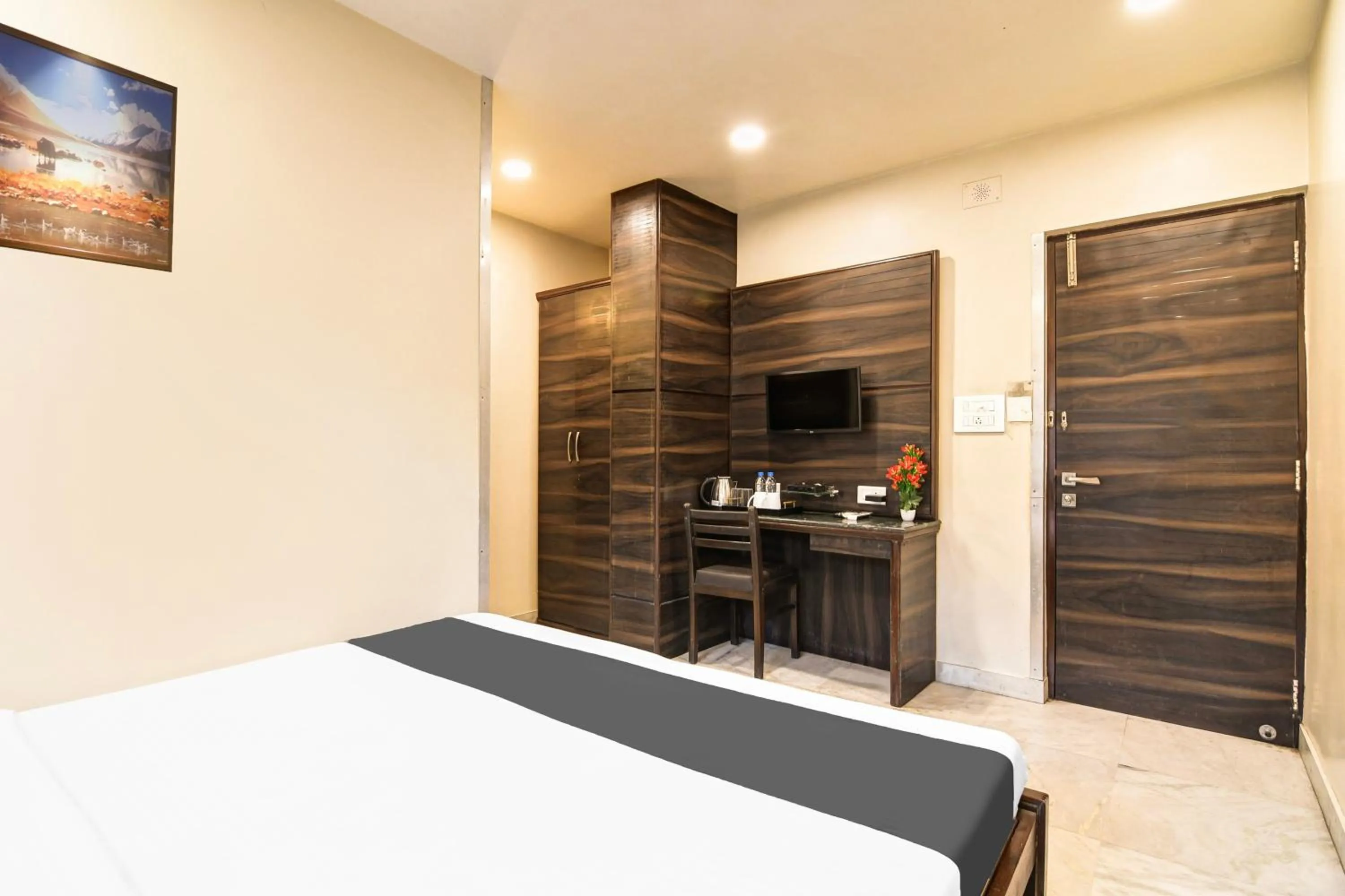 Bedroom in Super Collection O Belgacihia Near Kolkata Railway Station