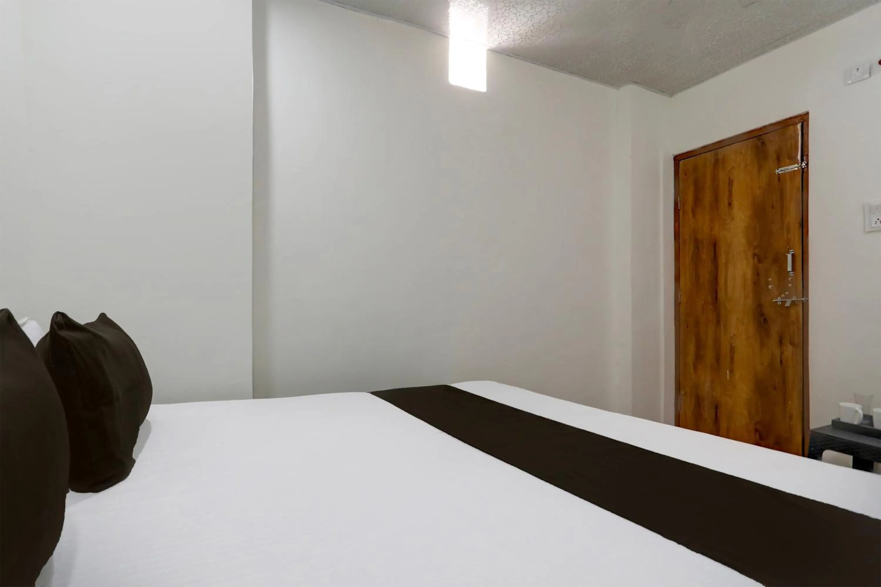 Bedroom in Hotel O Sky Villa