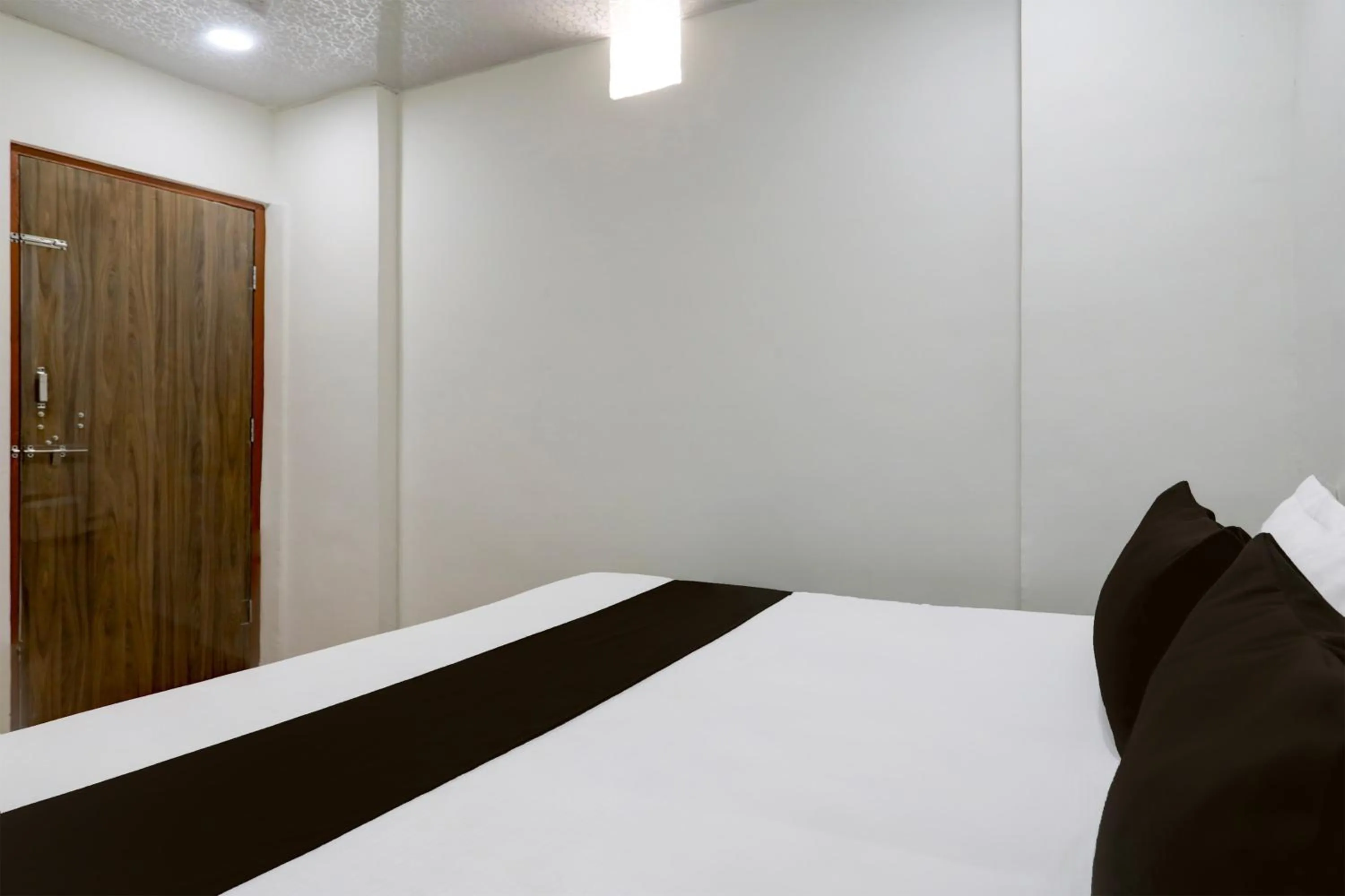 Bedroom in Hotel O Sky Villa