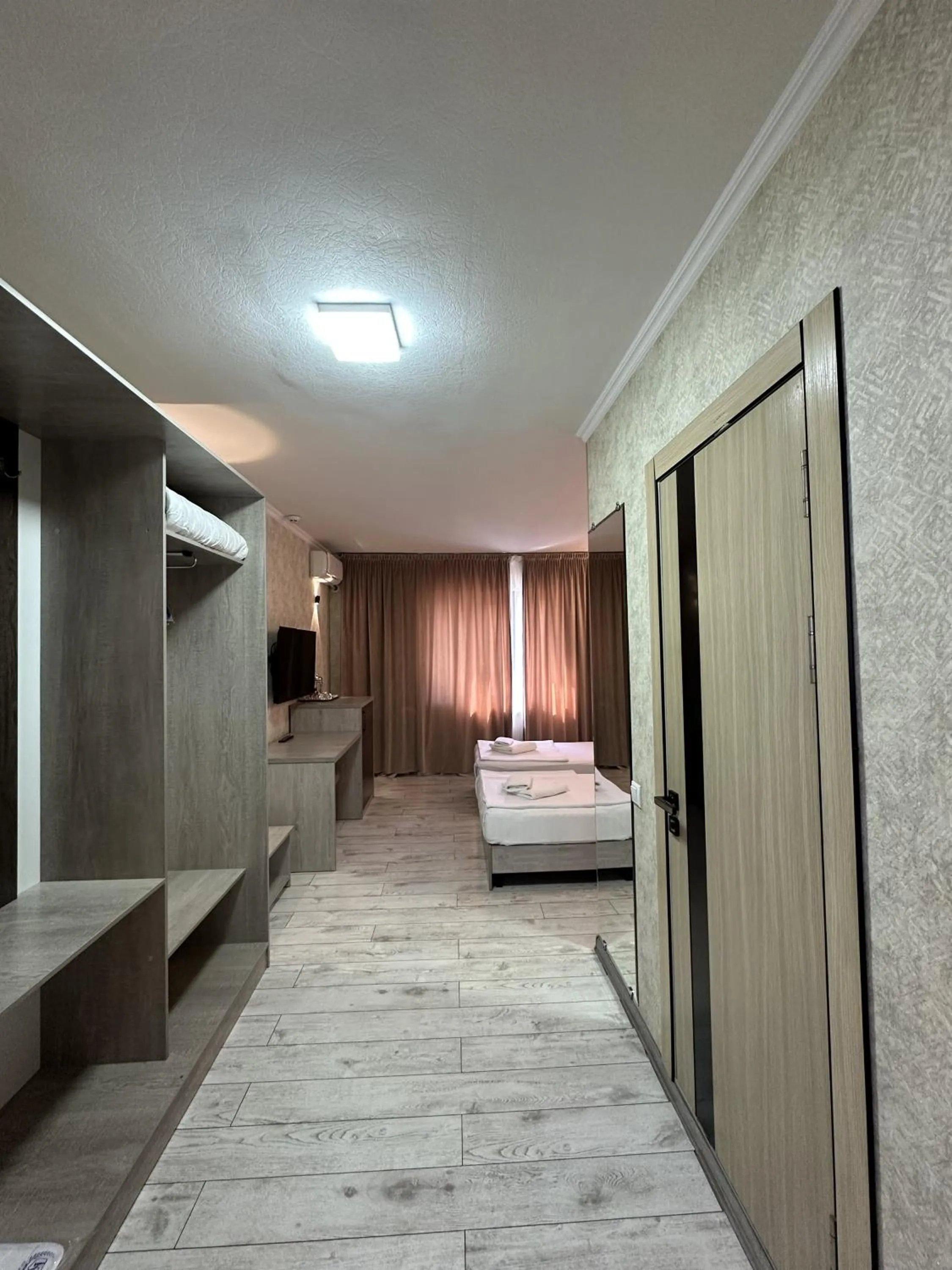 Photo of the whole room in Artist Regency Hotel