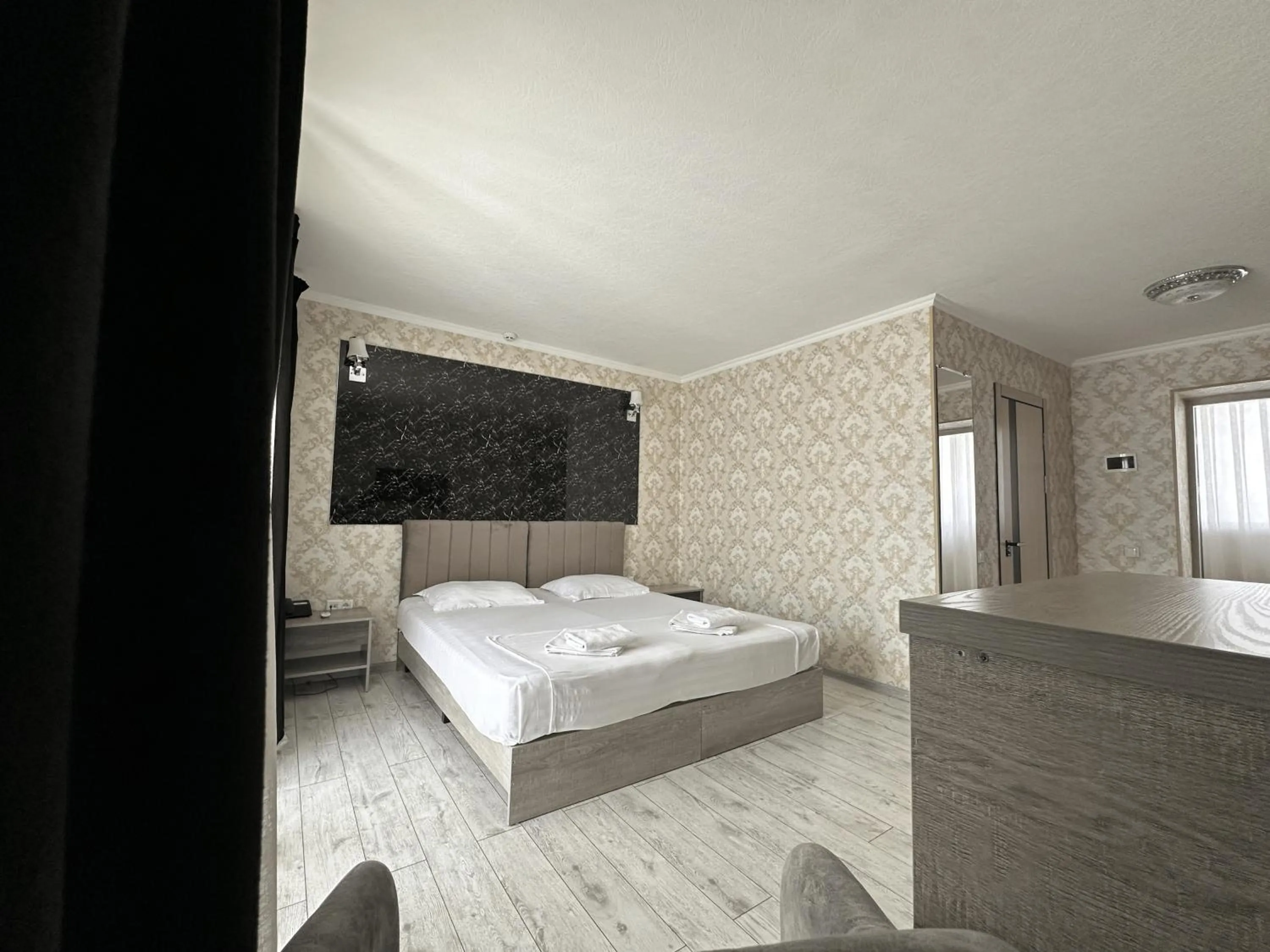 Bed in Artist Regency Hotel