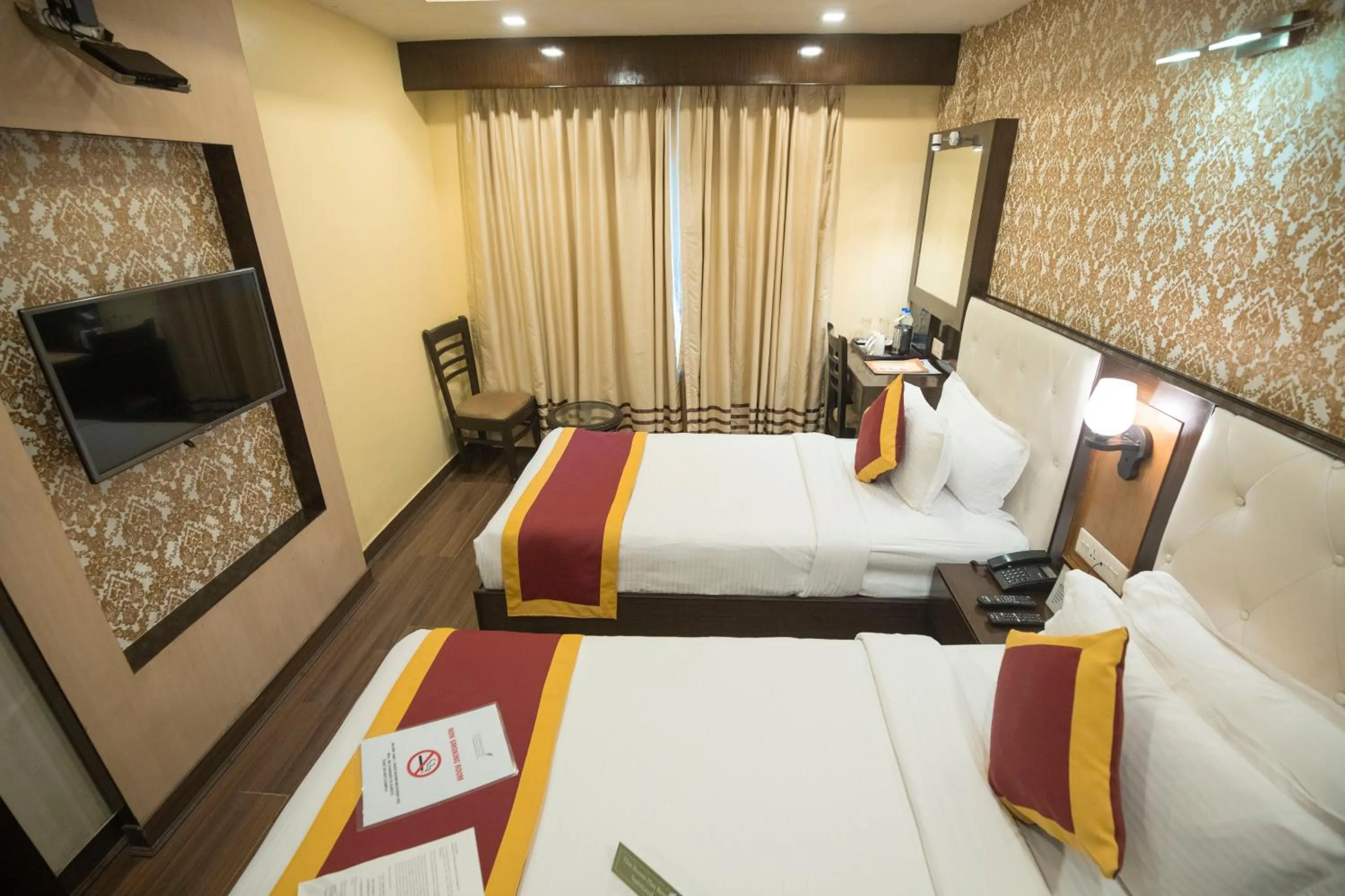 Bed in Ethnotel, Kolkata Airport