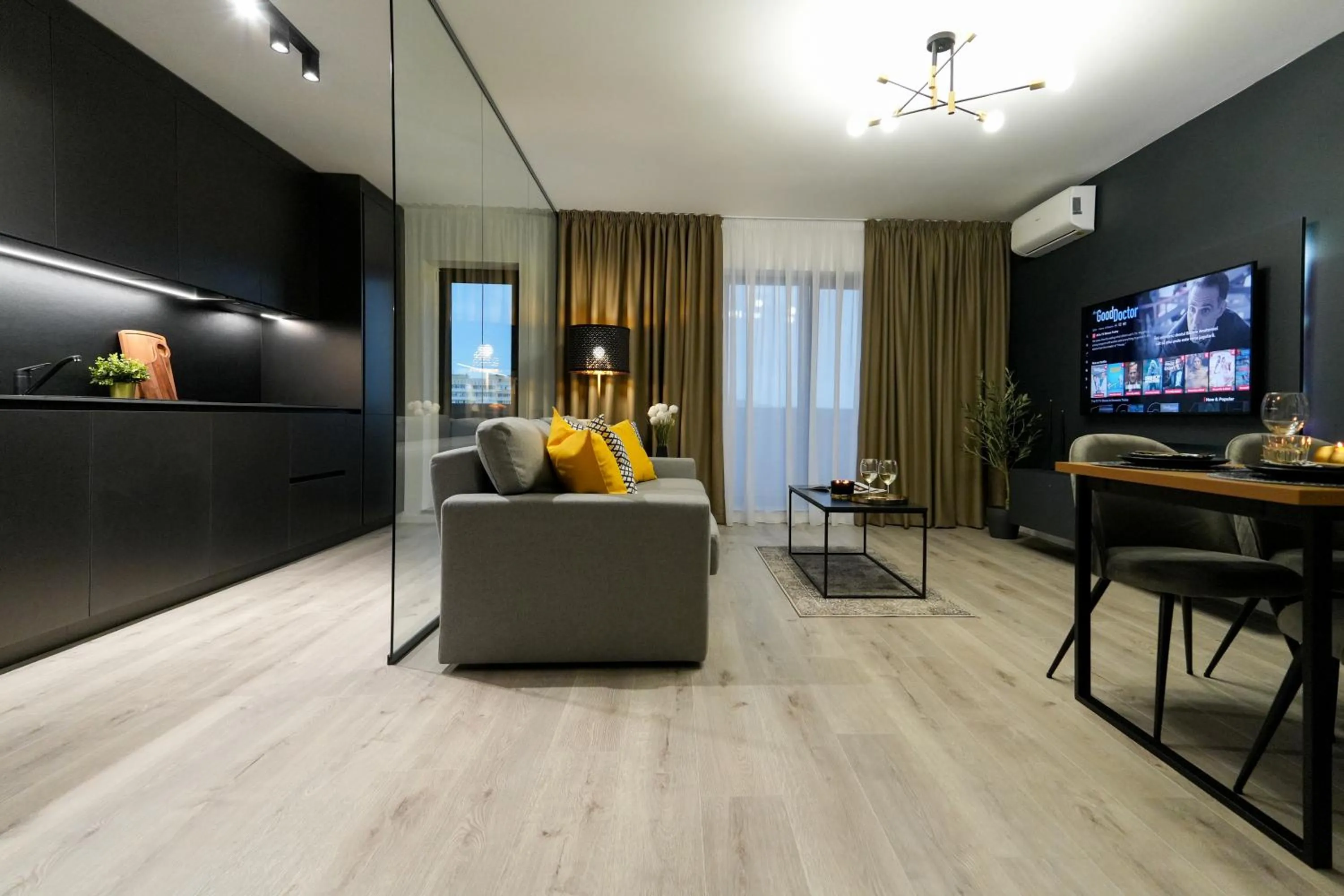 Living room in Luca - Luxury Park-View Apt with Balcony & Parking