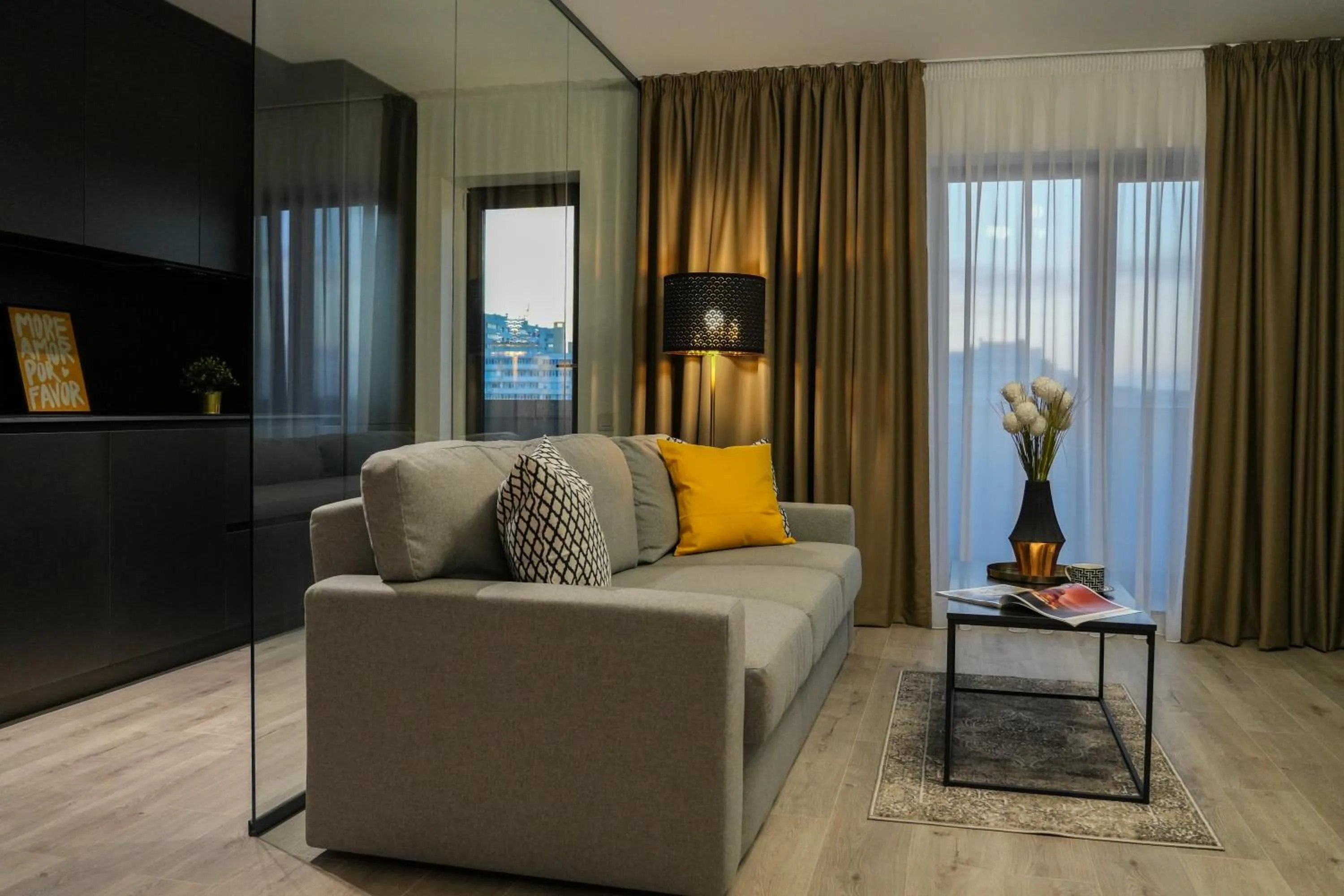 Living room in Luca - Luxury Park-View Apt with Balcony & Parking
