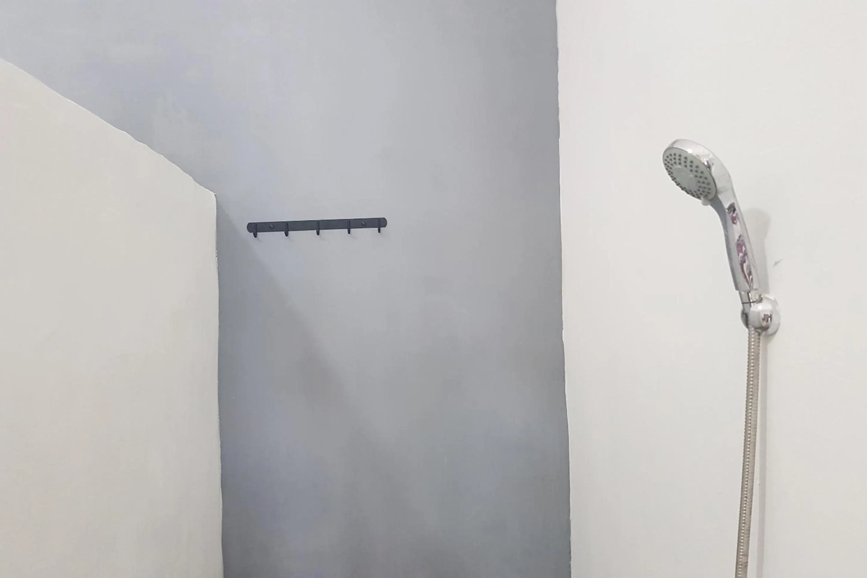 Bathroom in Hotel O Tasya Homestay