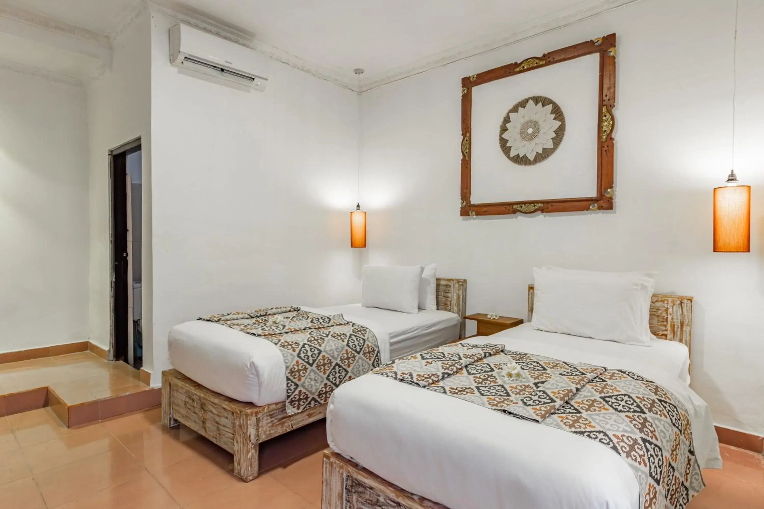 Economy Twin Room in Capital O 93944 Geweka Homestay Economy Twin Room in Capital O 93944 Geweka Homestay