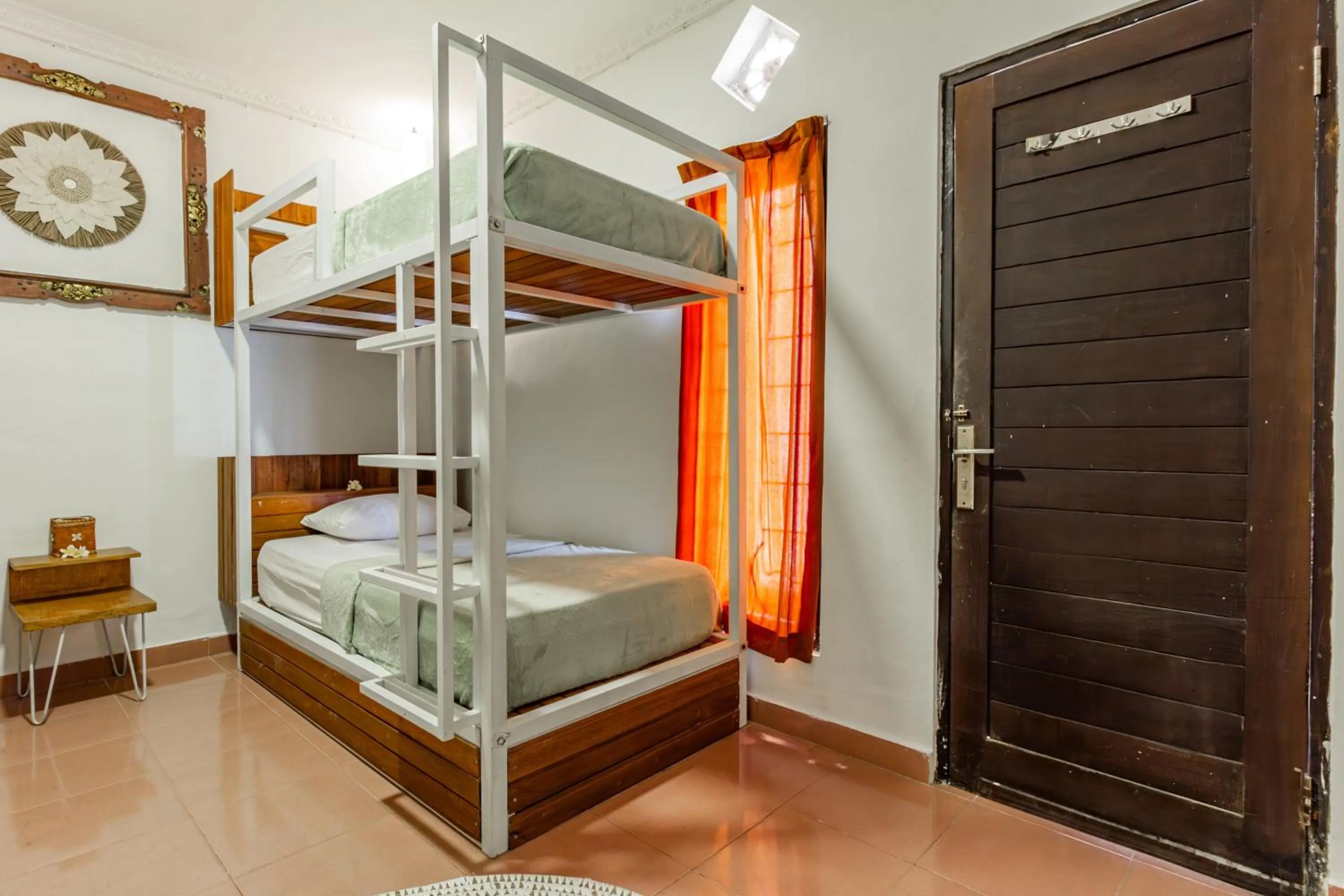 Bedroom in Capital O 93944 Geweka Homestay