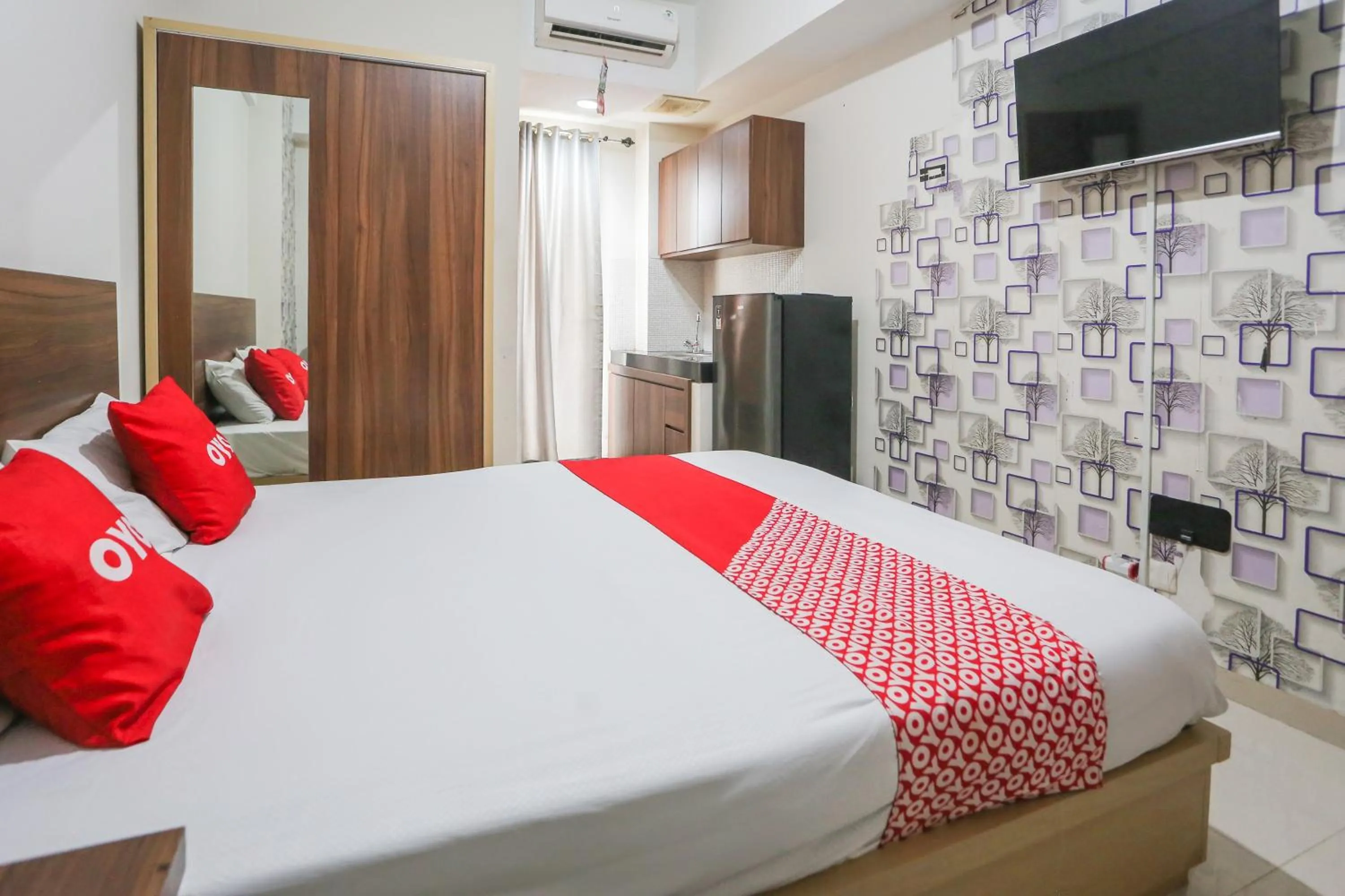 Bedroom, Bed in OYO 93948 Bunda Rachma Rooms