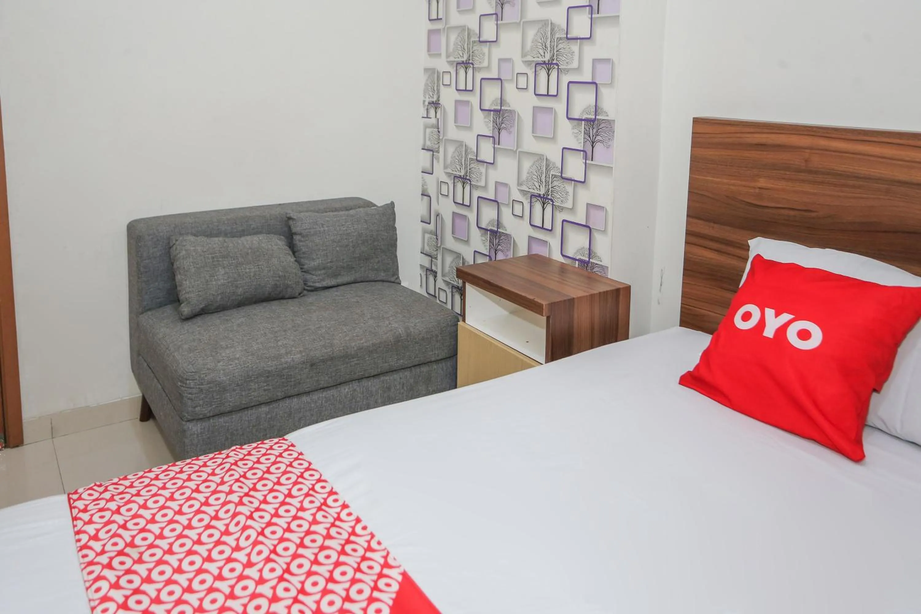 Bedroom, Bed in OYO 93948 Bunda Rachma Rooms