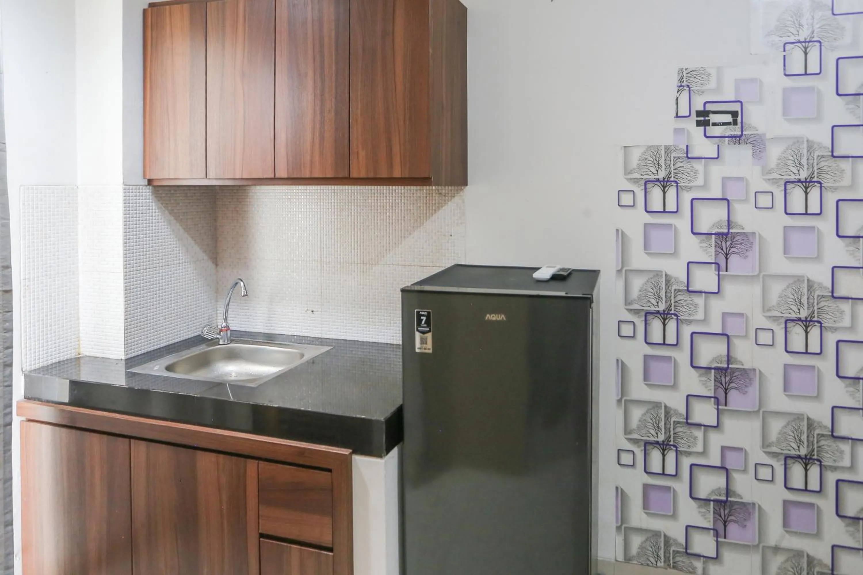 Bedroom in OYO 93948 Bunda Rachma Rooms