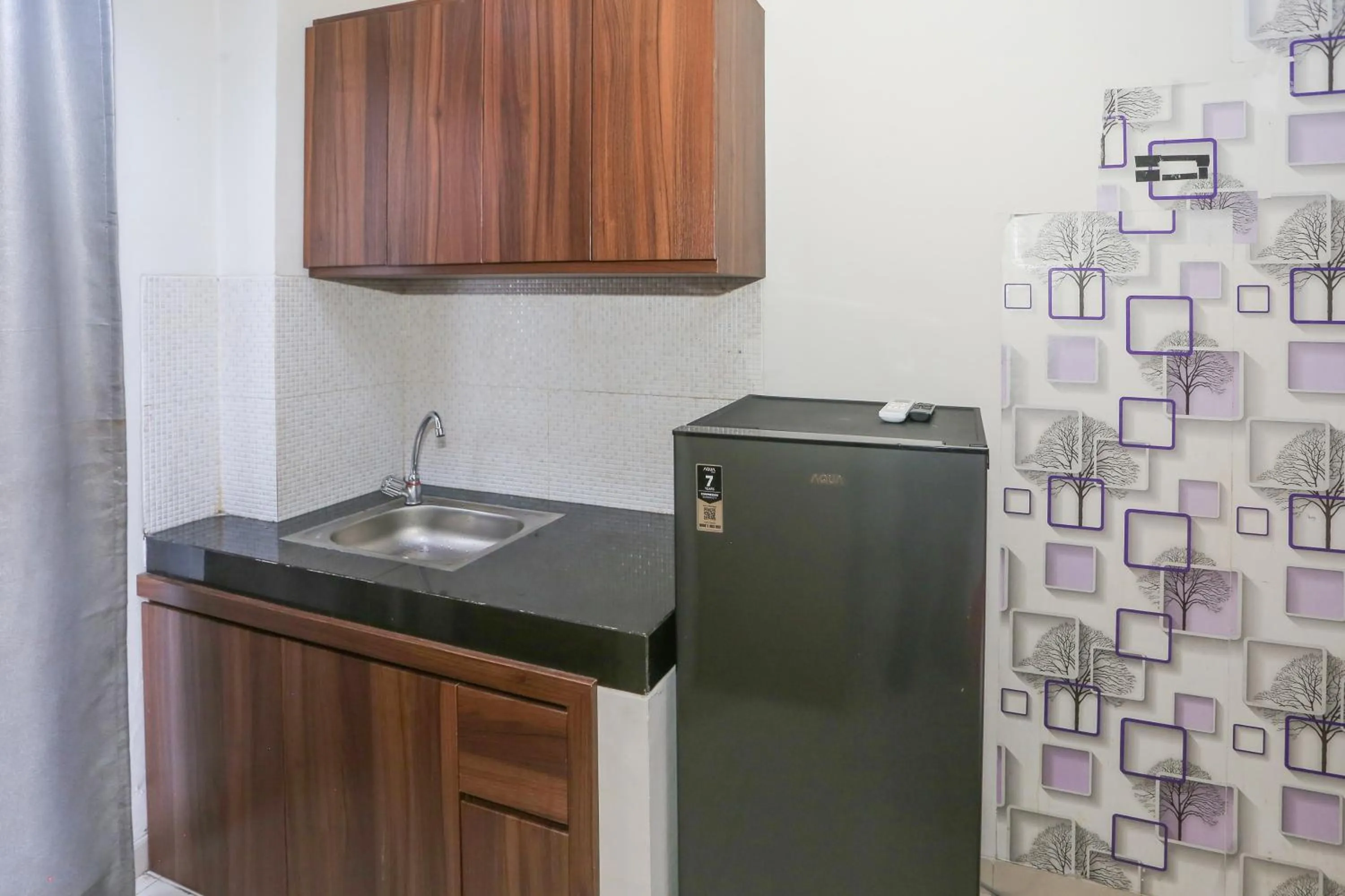 Bedroom in OYO 93948 Bunda Rachma Rooms