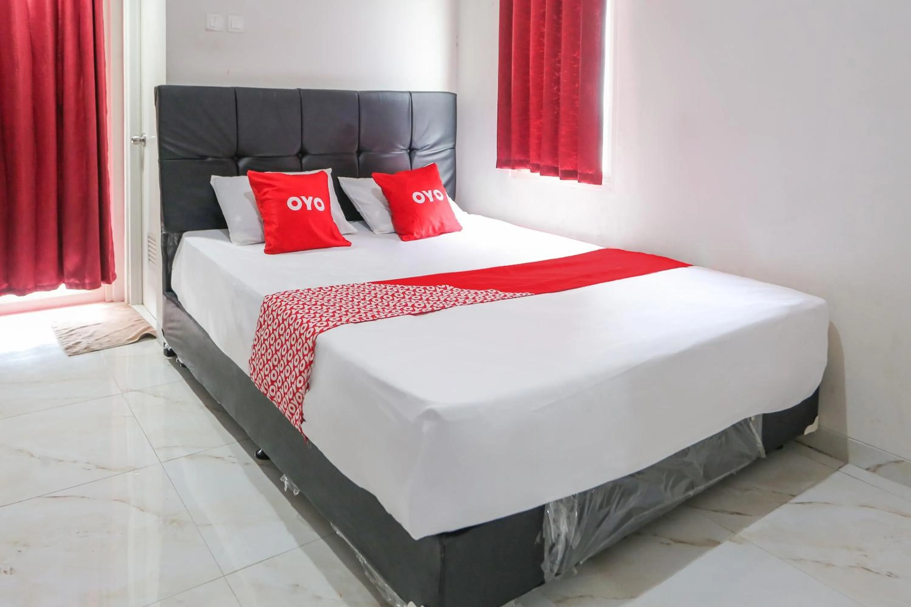 Bedroom, Bed in OYO 93948 Bunda Rachma Rooms