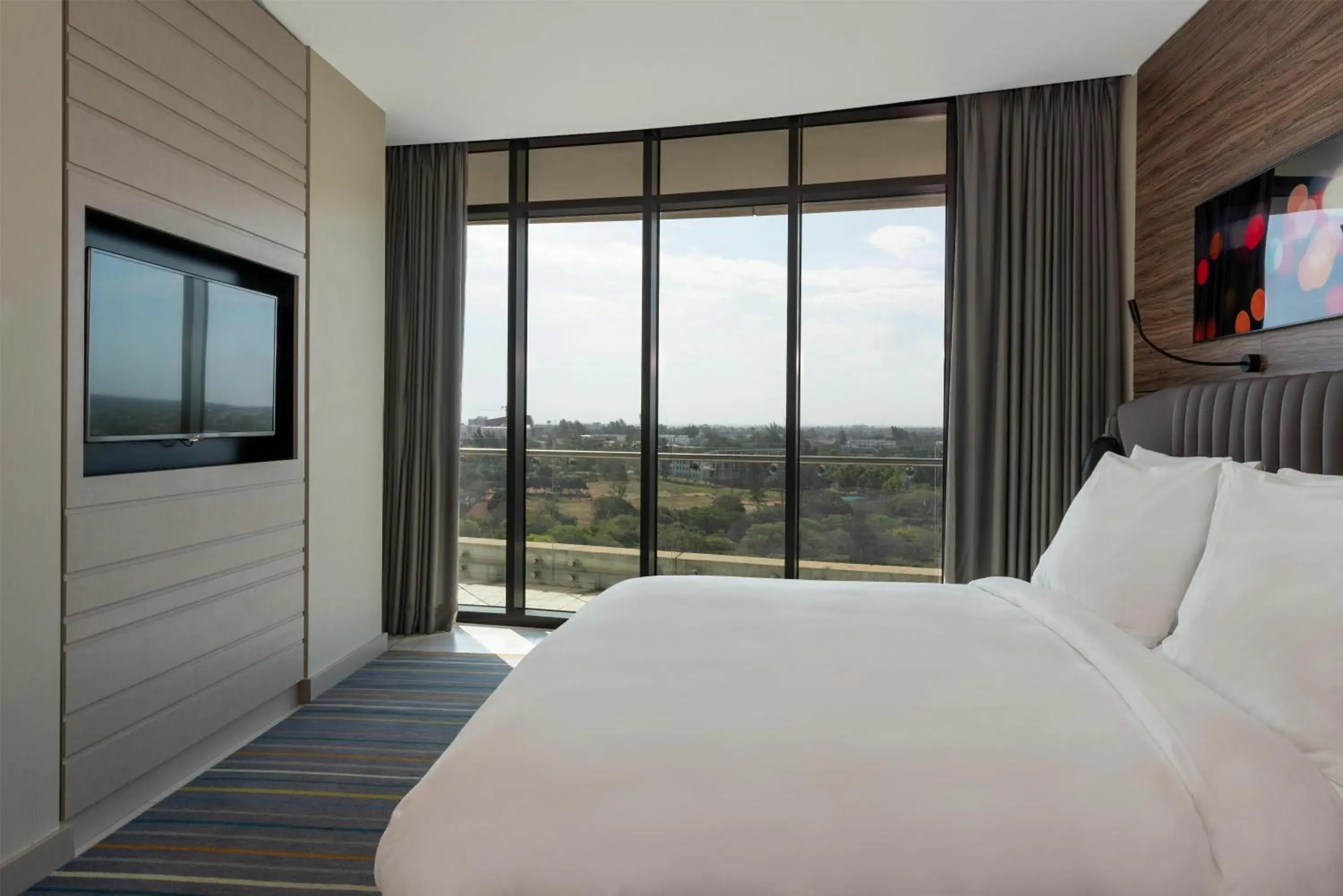 Photo of the whole room, Bed in Radisson Blu Hotel & Residence Maputo Photo of the whole room, Bed in Radisson Blu Hotel & Residence Maputo