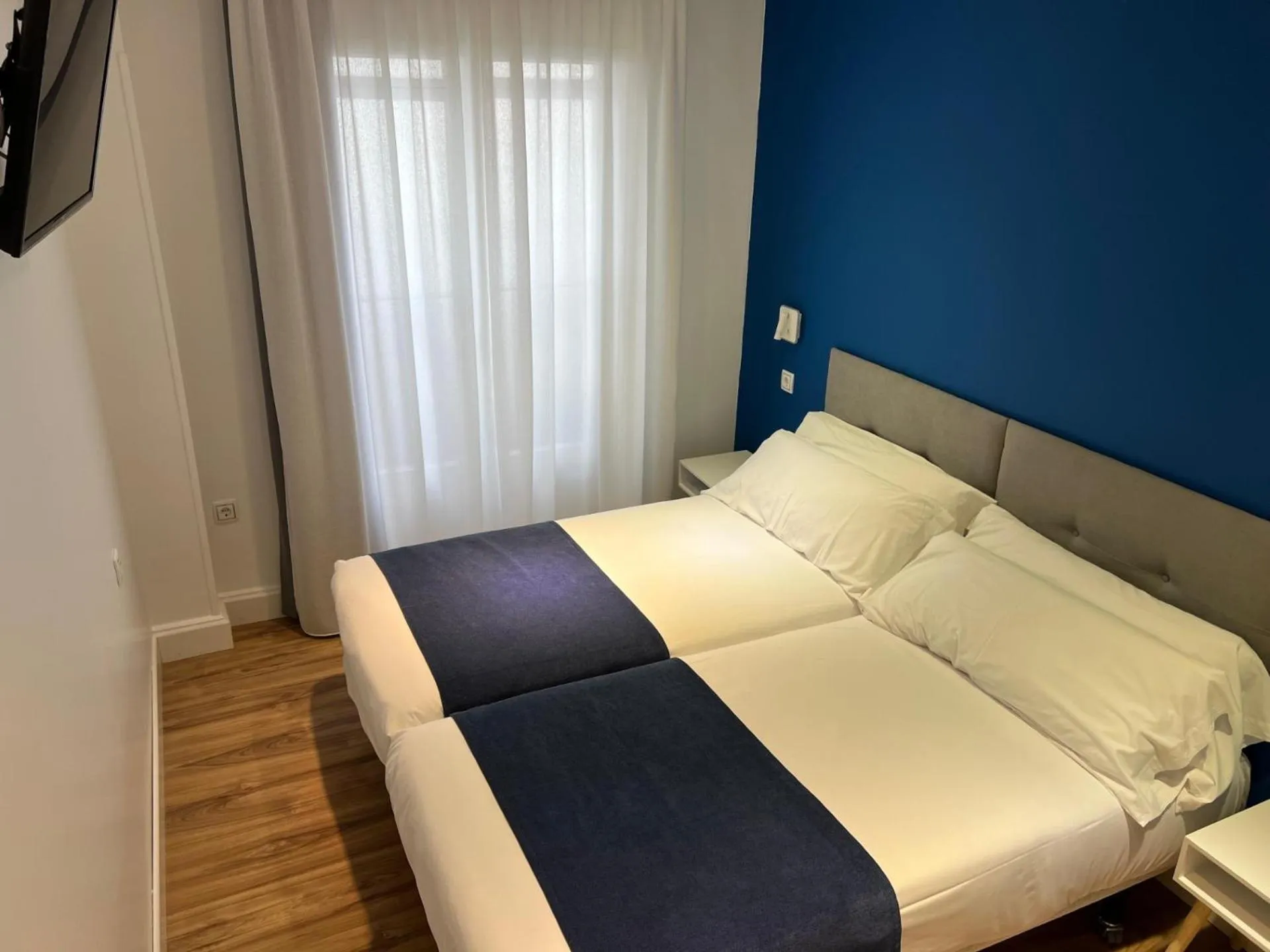 Photo of the whole room, Bed in Casual Blue