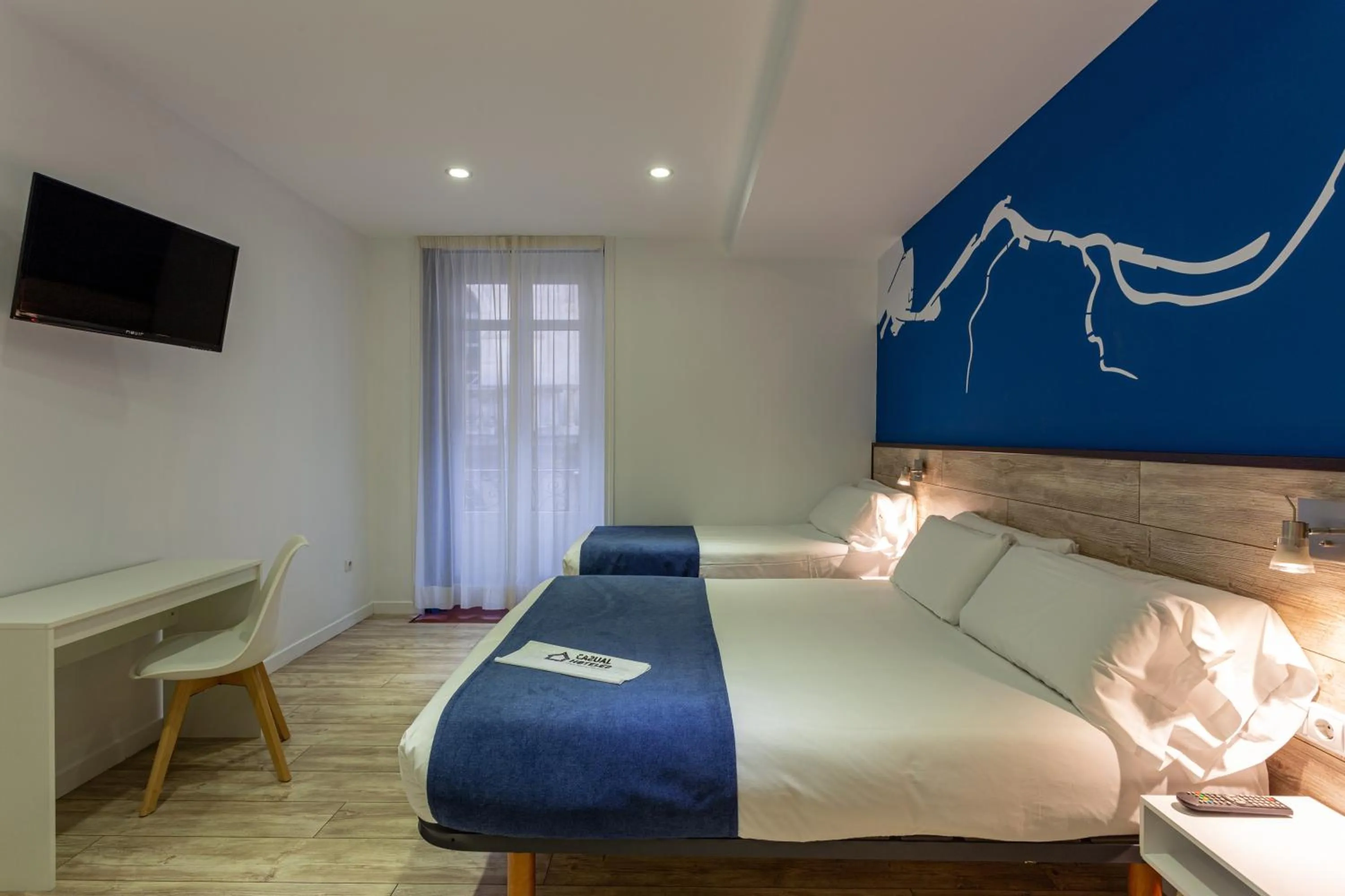 Photo of the whole room, Bed in Casual Blue