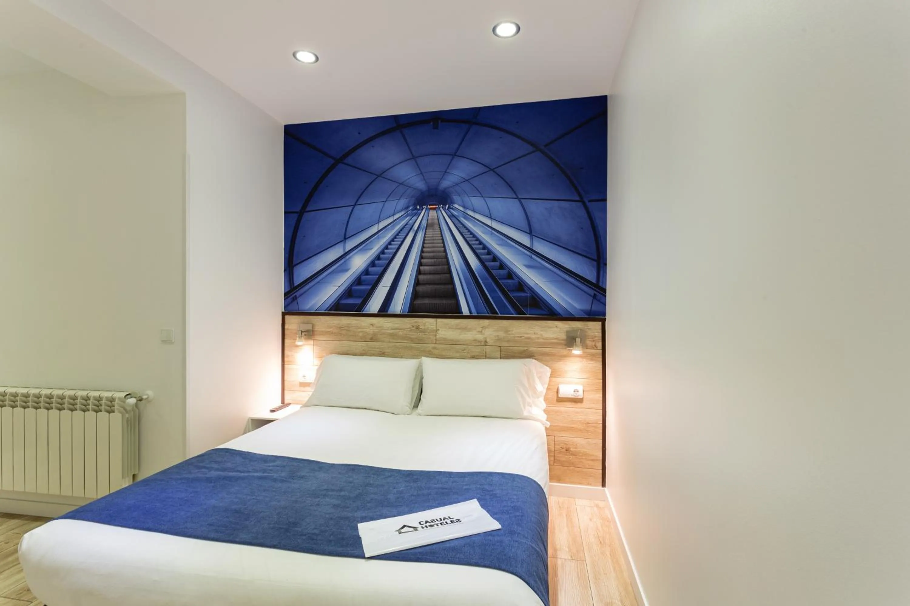 Photo of the whole room, Bed in Casual Blue