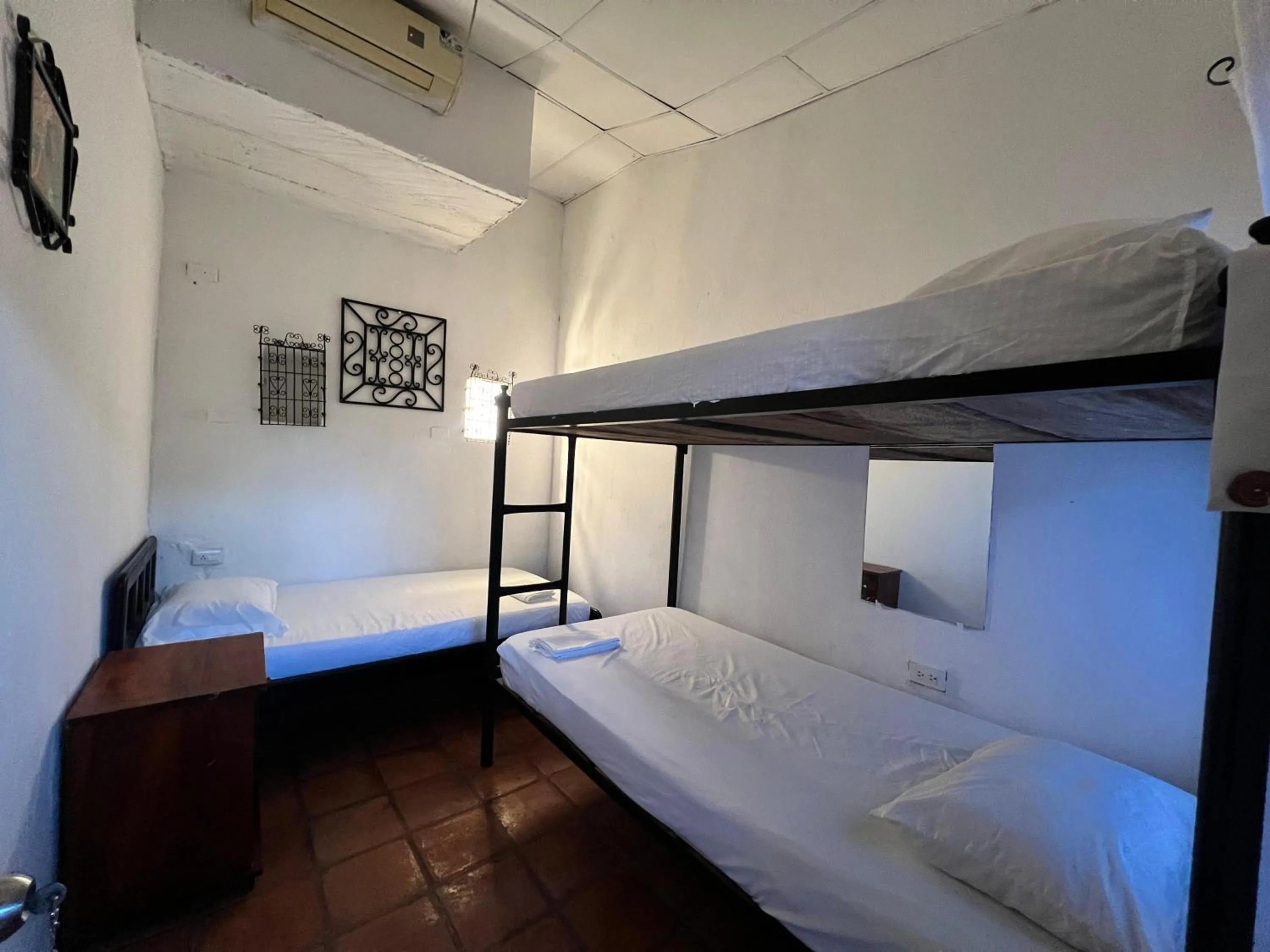 Bed in La Casa del Viajero Mompos