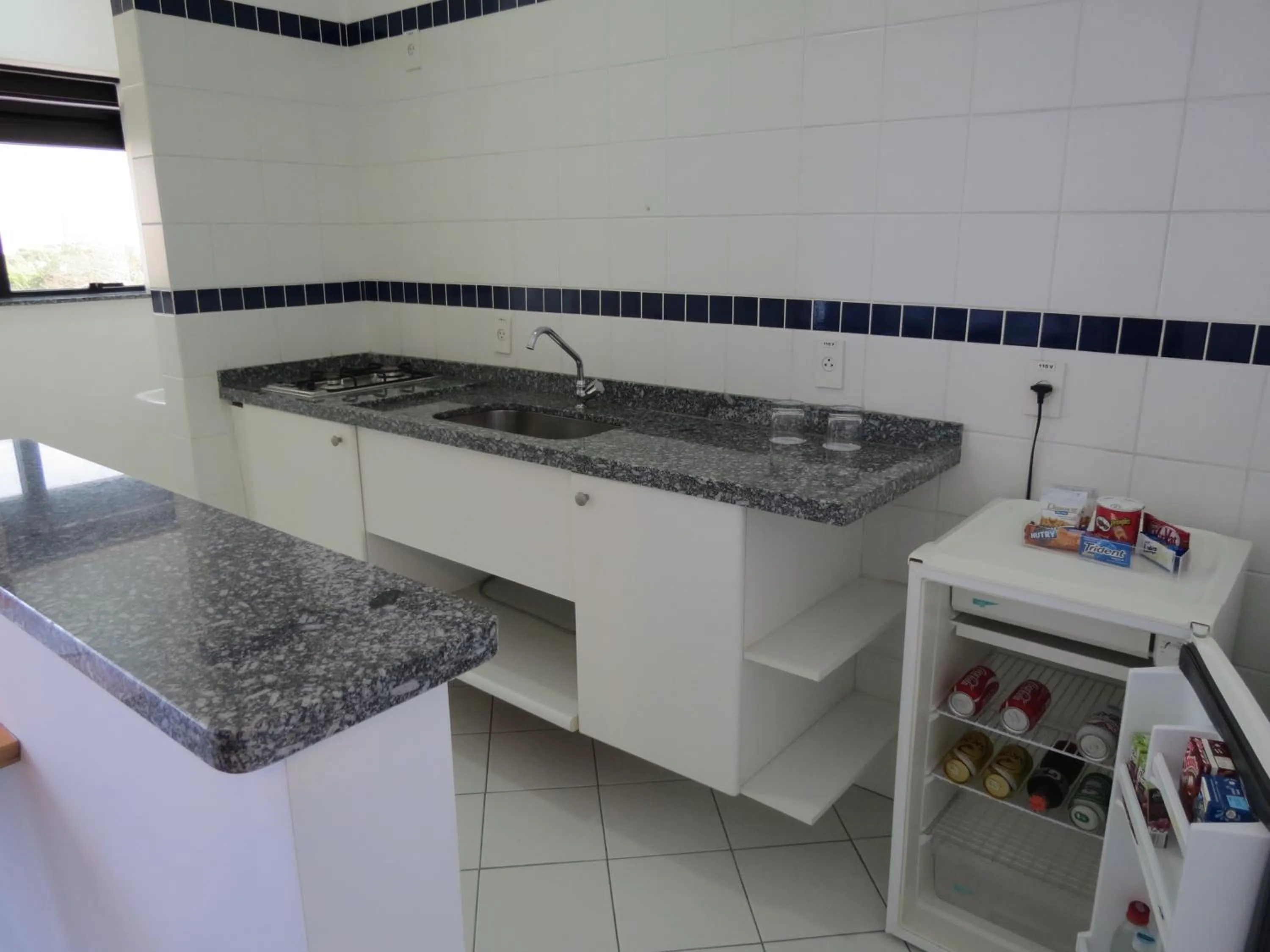 Kitchen or kitchenette in Marsala Apart Hotel