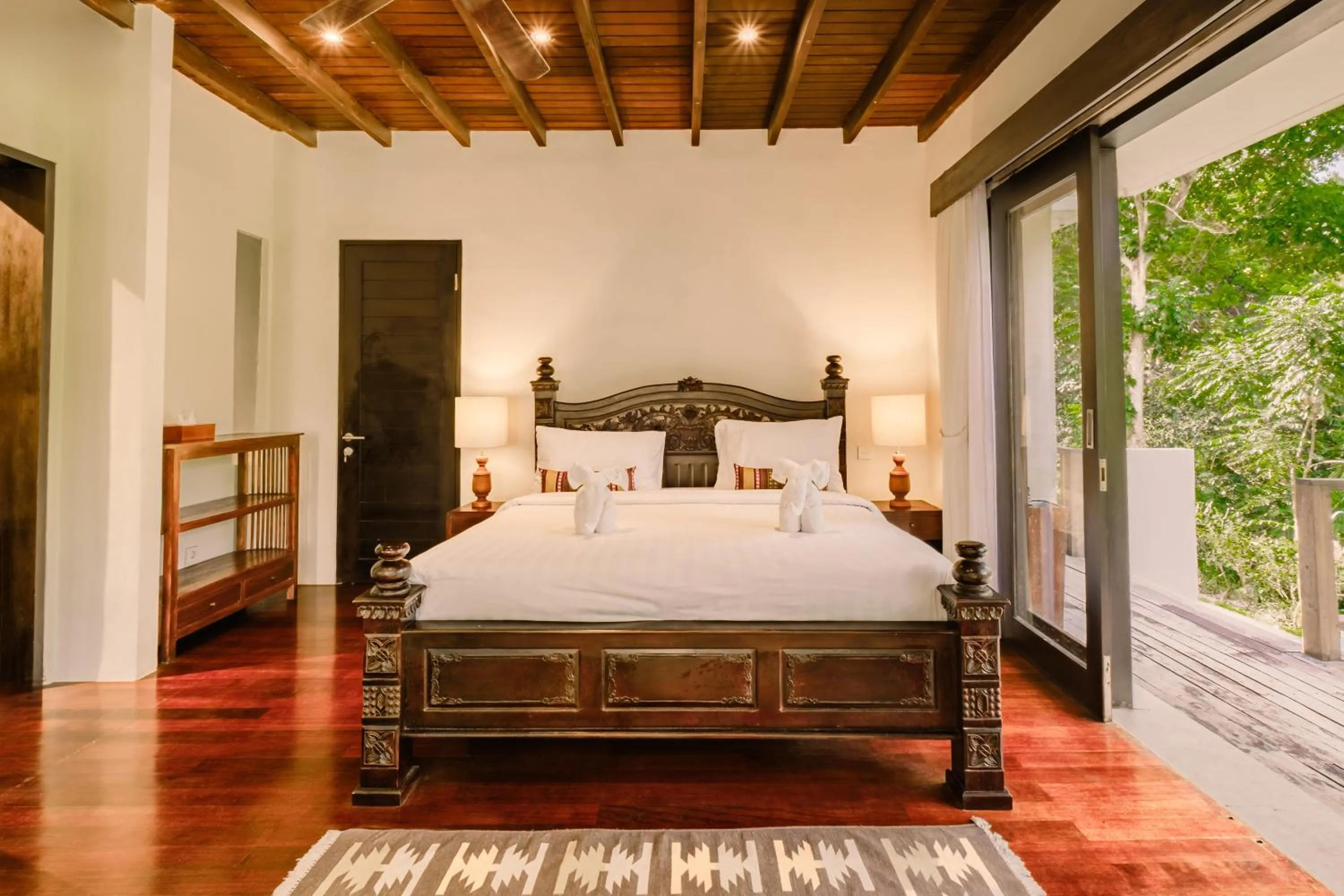 Bed in BeingSattvaa Luxury Ubud