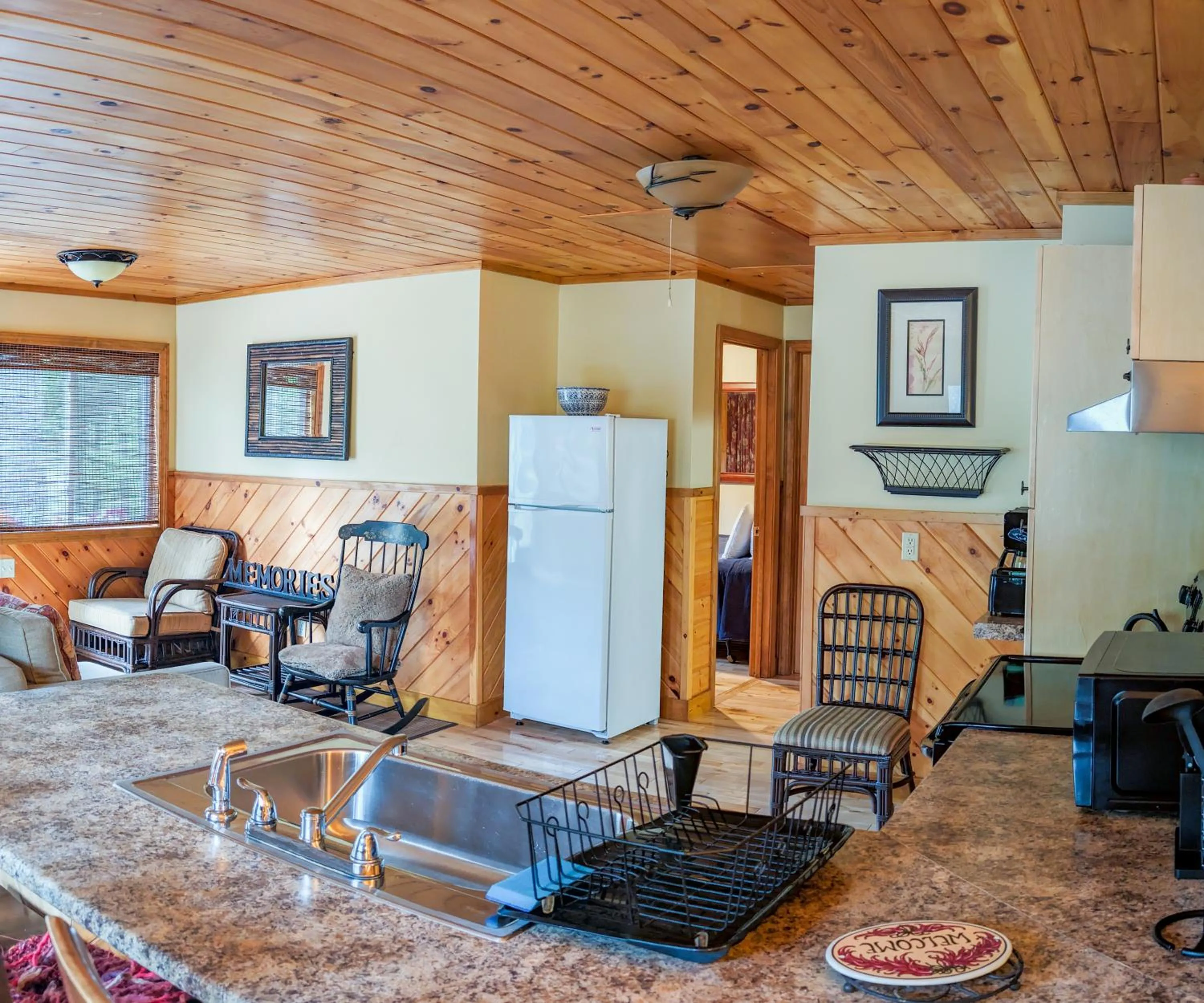 Family Two Bedroom Cabin with Living Room, Kitchen & Deck in Hinckleys Dreamwood Cottages