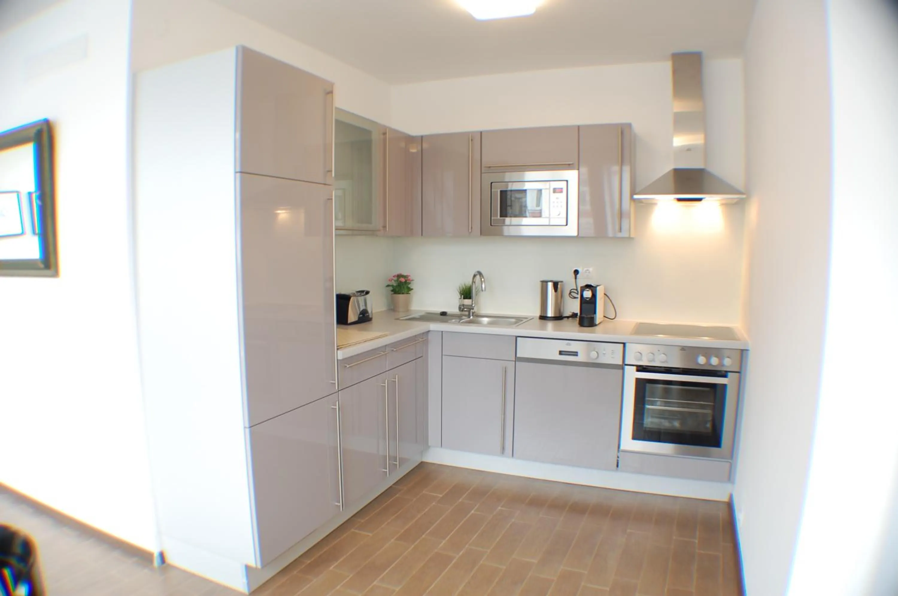 Kitchen or kitchenette in Alga Apartments am Westbahnhof