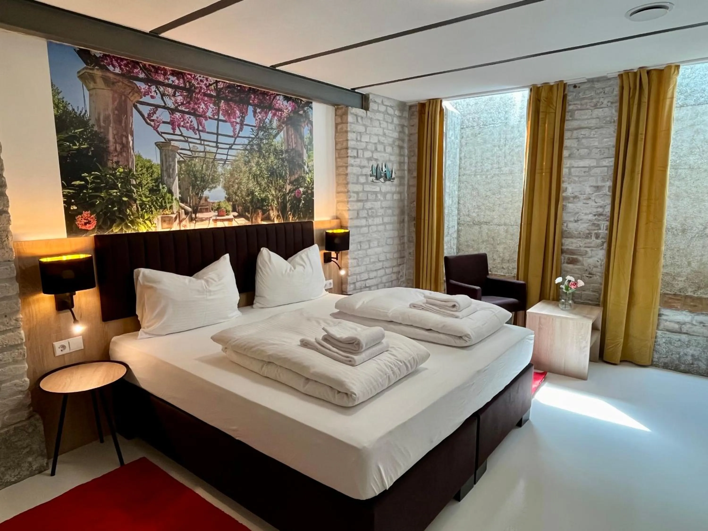 Bed in Adlzreiter City Pension