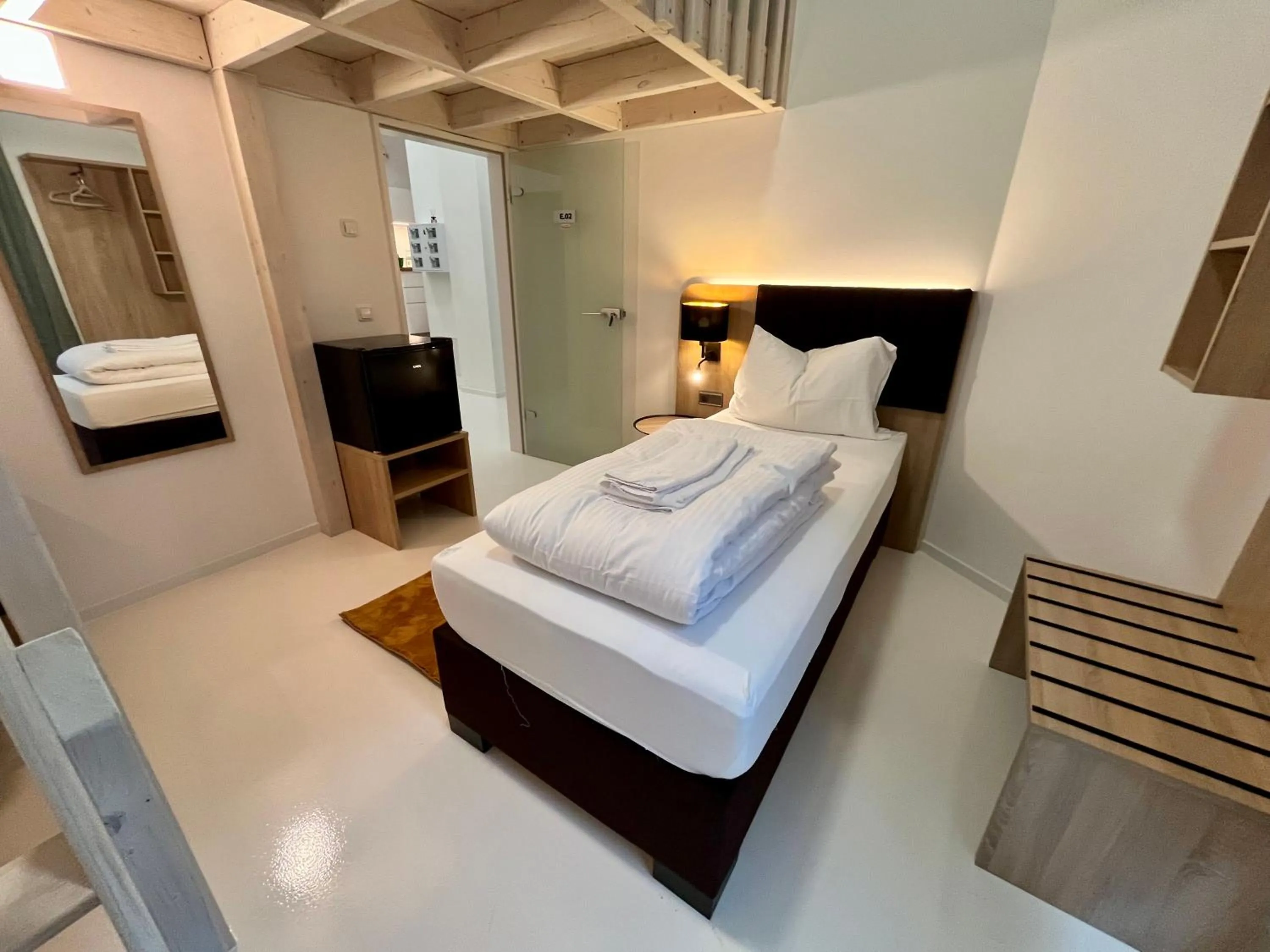 Bed in Adlzreiter City Pension