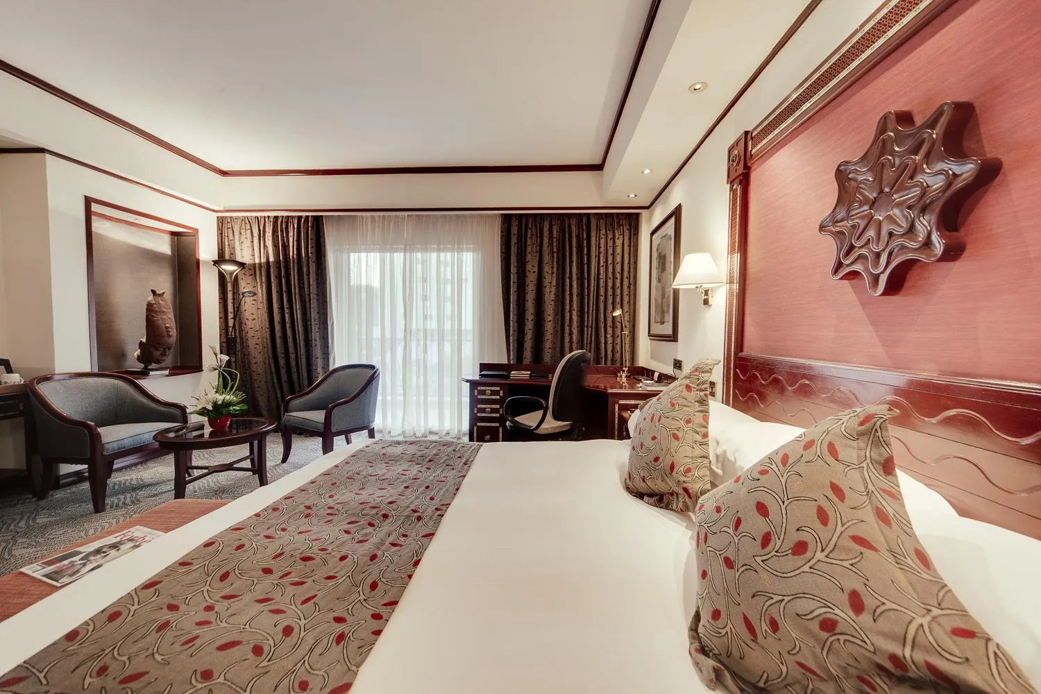 Seating area, Bed in Kampala Serena Hotel