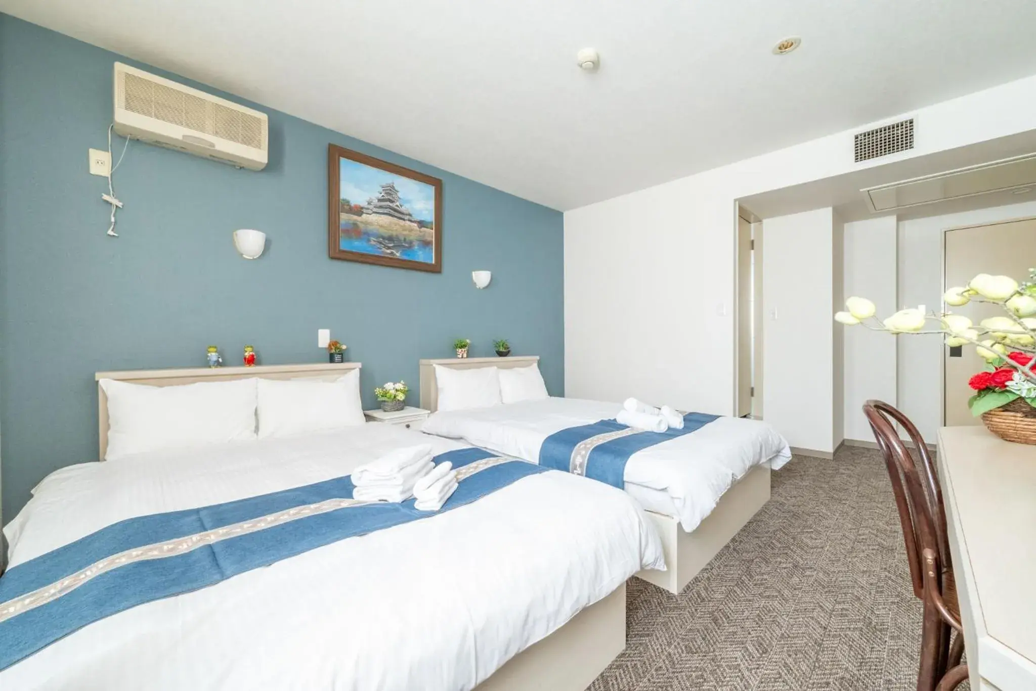 Bedroom, Bed in Plaza In Miyakojima hotel Bedroom, Bed in Plaza In Miyakojima hotel