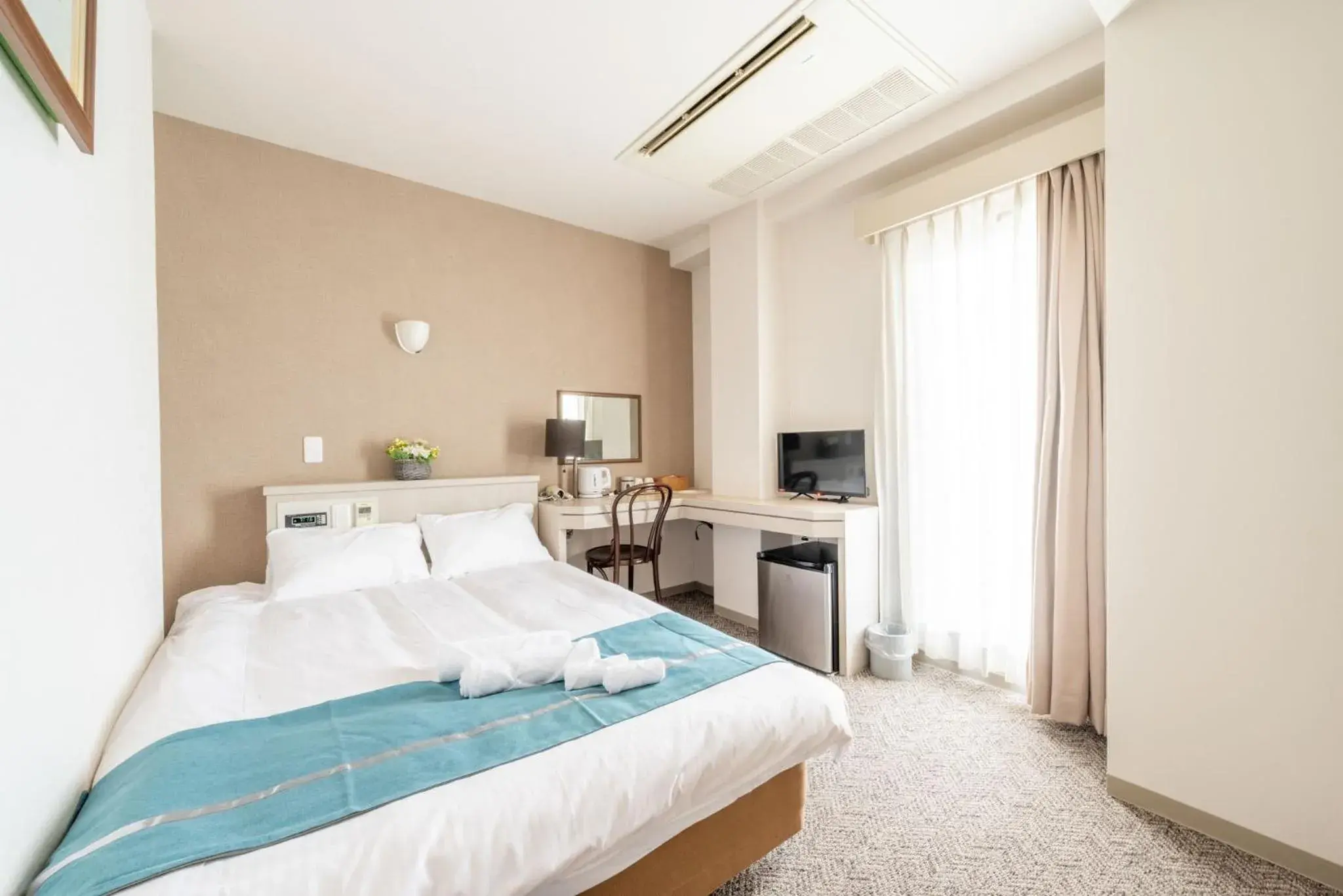 Bedroom, Bed in Plaza In Miyakojima hotel Bedroom, Bed in Plaza In Miyakojima hotel