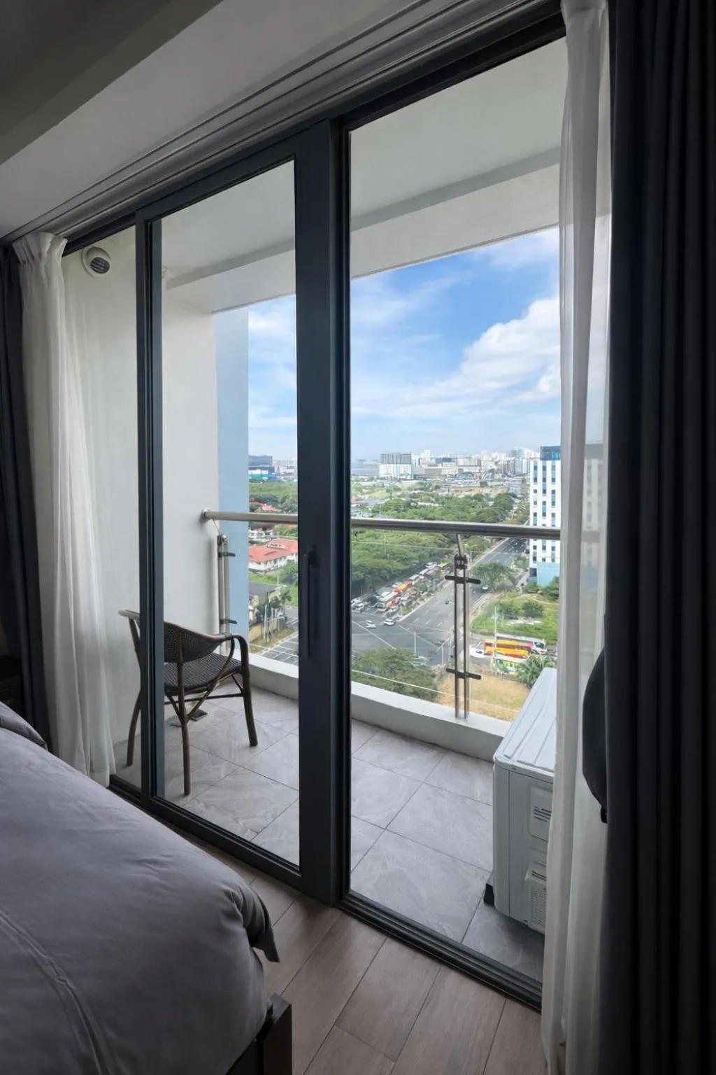 Natural landscape, Bed in LCONDOTEL Hotel Studio with Balcony at Imperial Plaza near MOA NAIA PITX