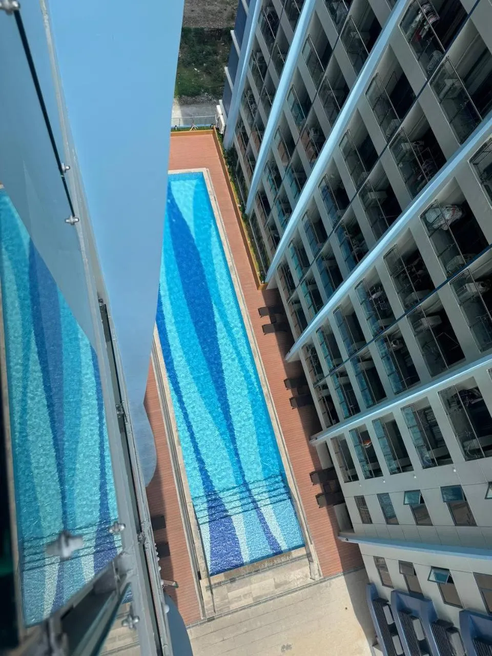 Property building in LCONDOTEL Hotel Studio with Balcony at Imperial Plaza near MOA NAIA PITX