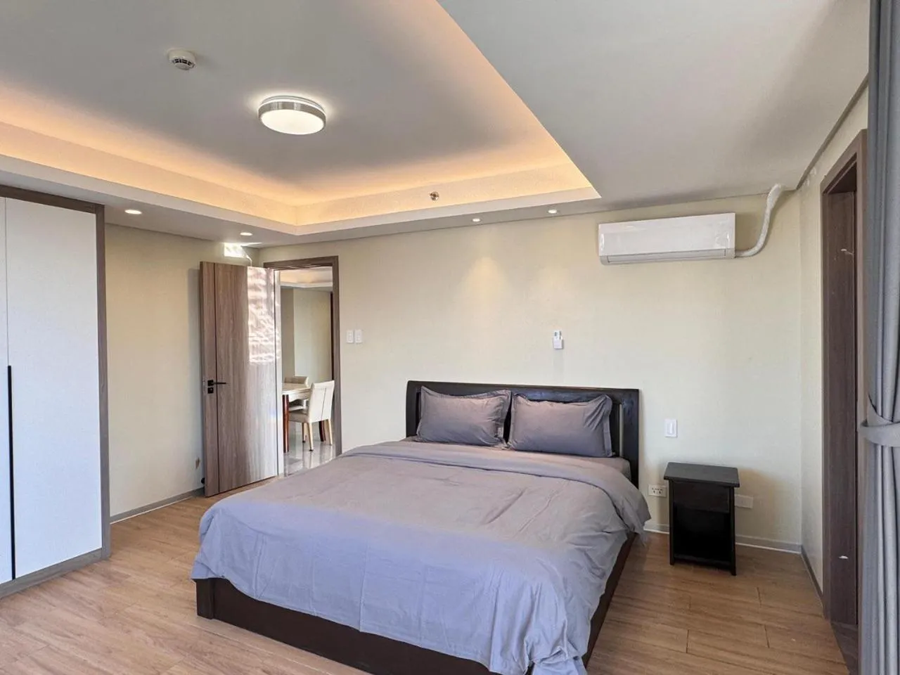 Bed in LCONDOTEL Hotel Studio with Balcony at Imperial Plaza near MOA NAIA PITX