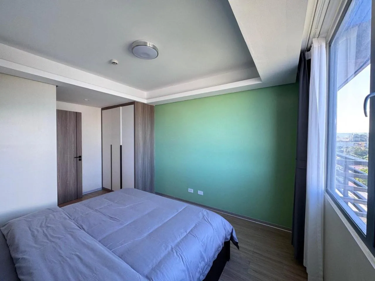 Bed in LCONDOTEL Hotel Studio with Balcony at Imperial Plaza near MOA NAIA PITX